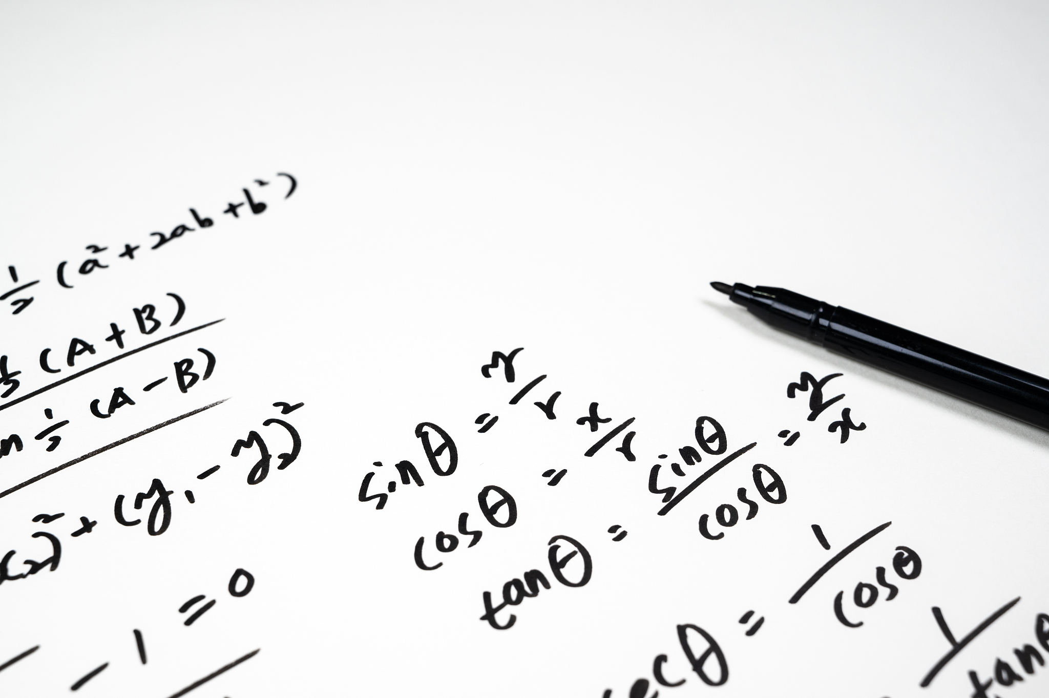 a note full of mathematical formulas. education concept