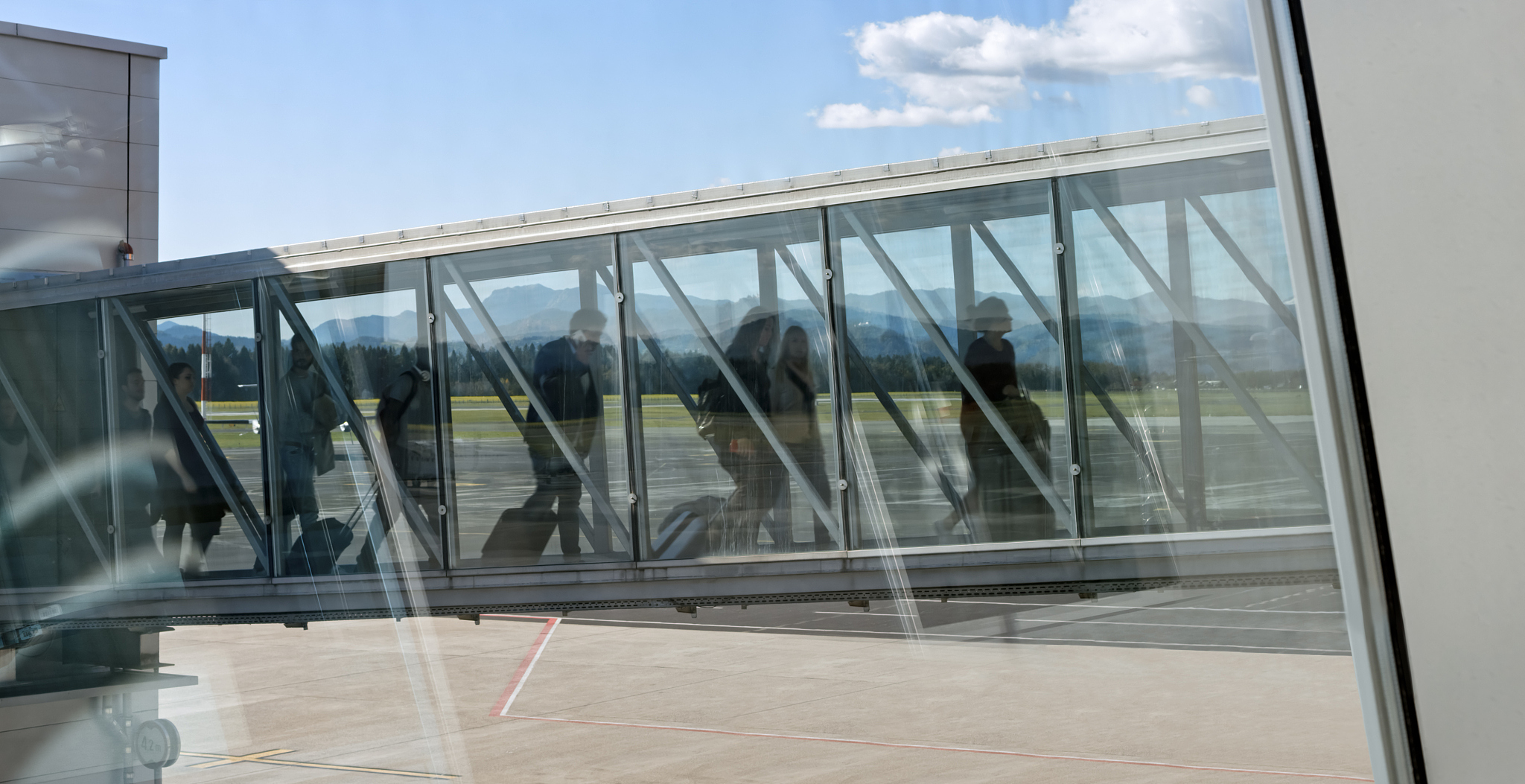 people walking on elevated walkway