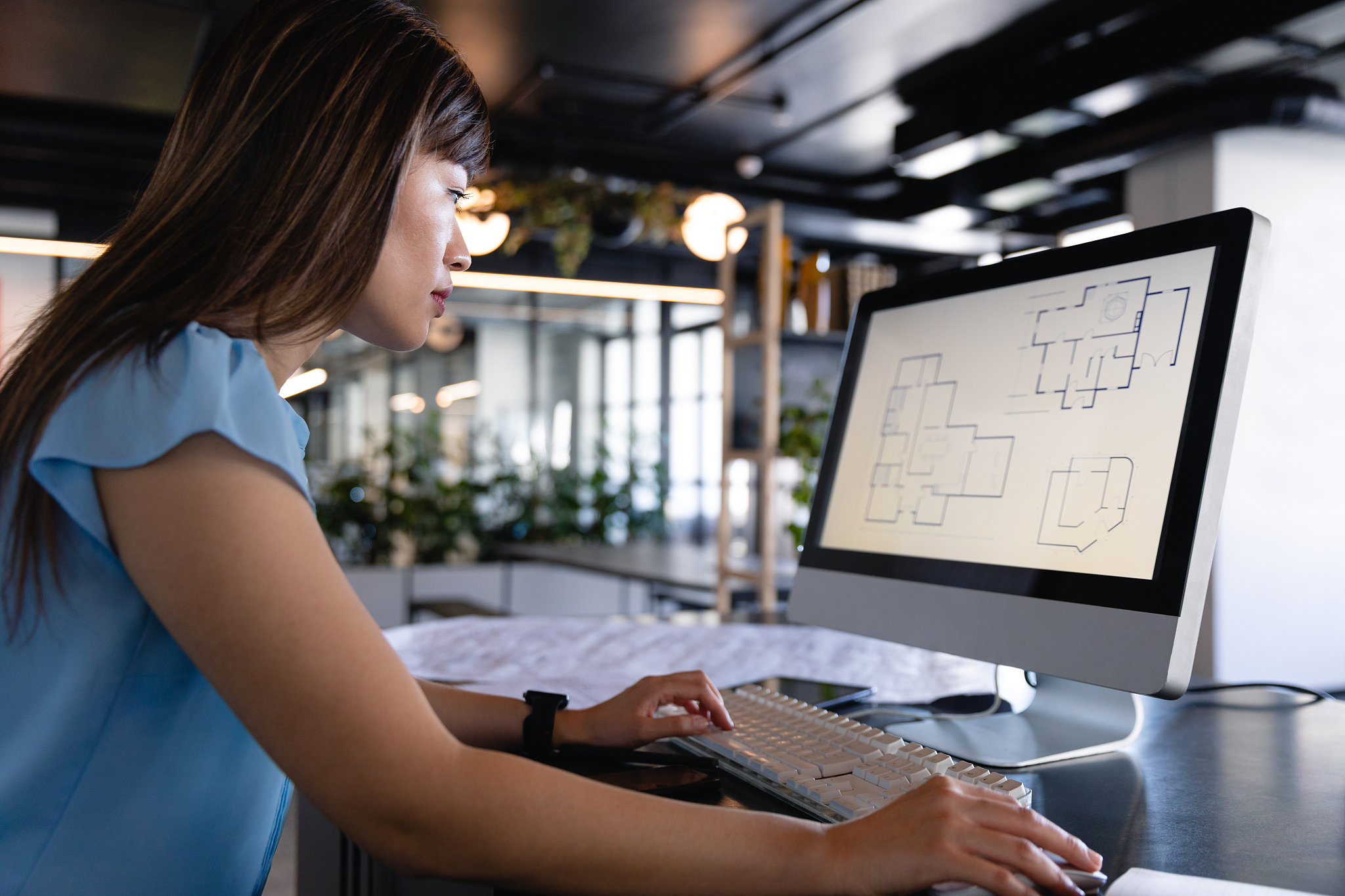 asian architect woman working on computer