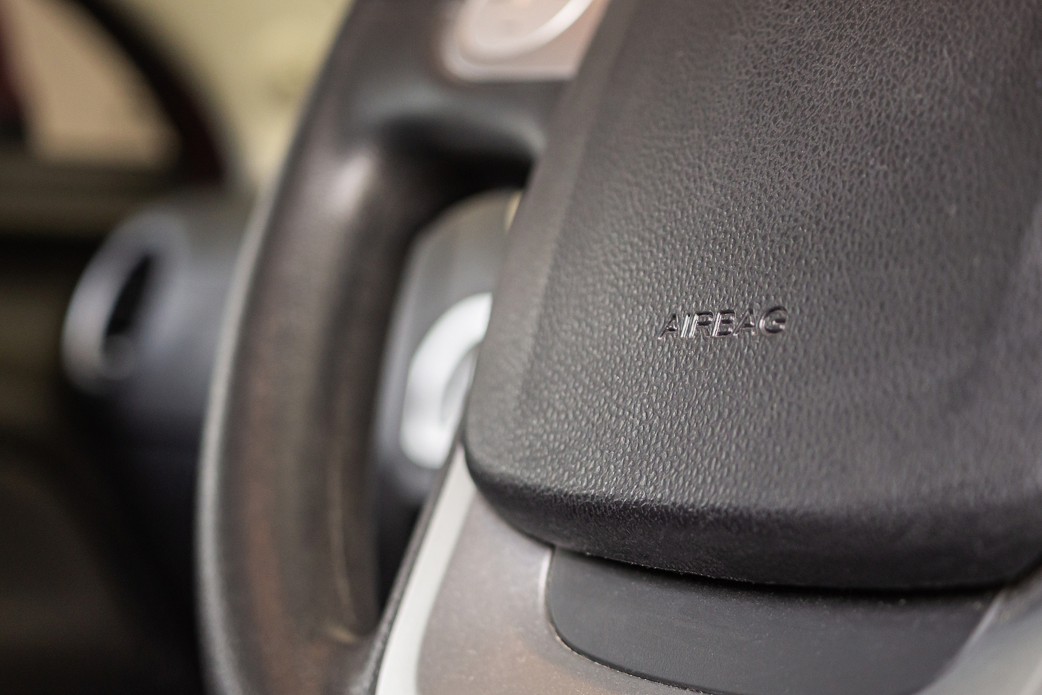 safety airbag sign on car steering wheel