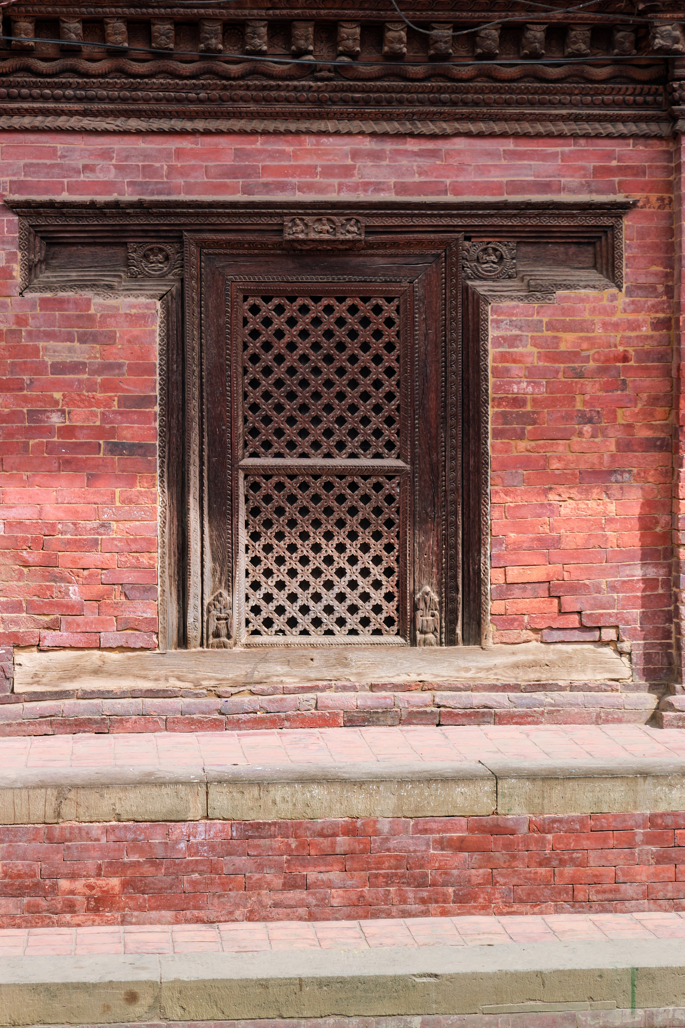 window carving of the patan durbar square, patan