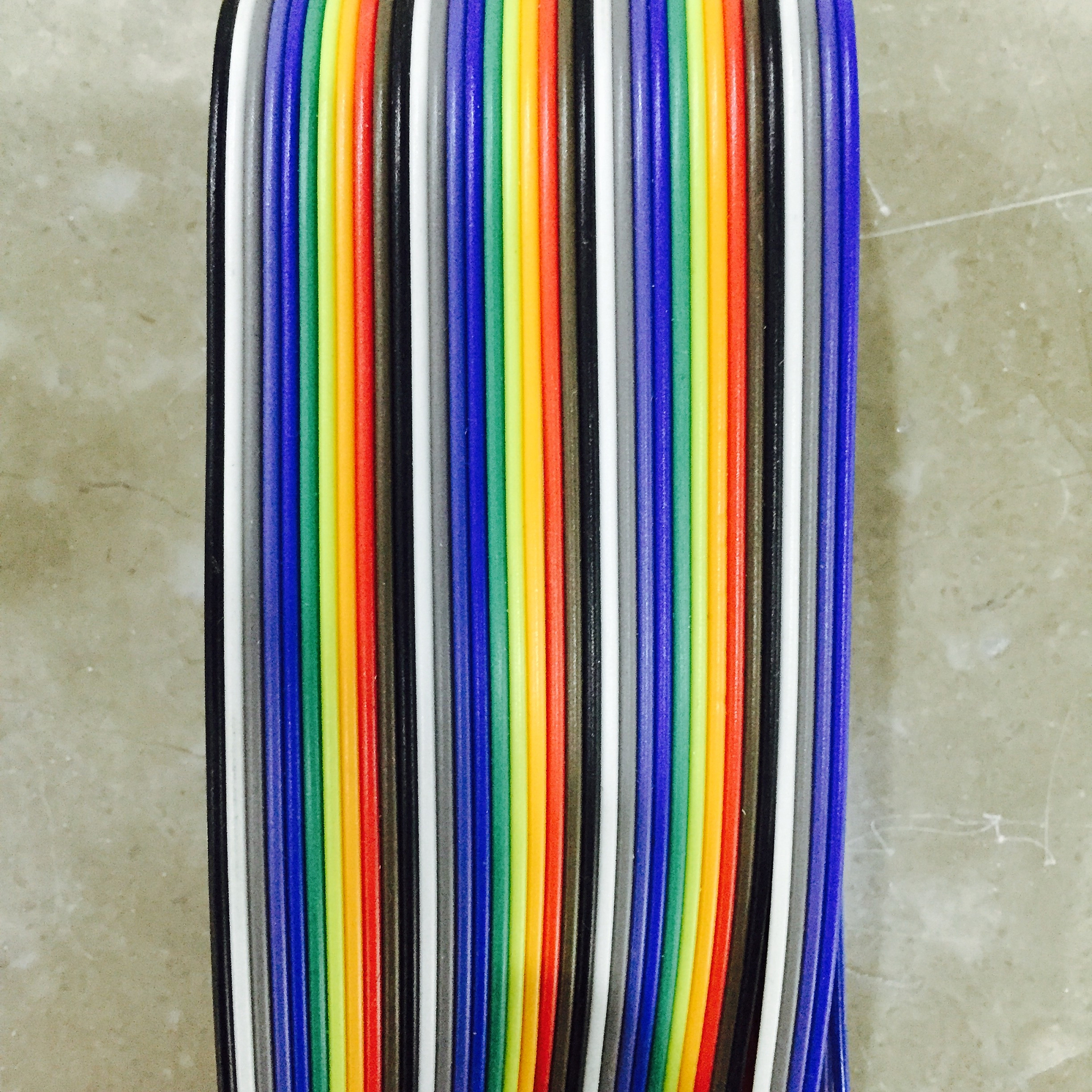 close-up of multi colored cables against wall