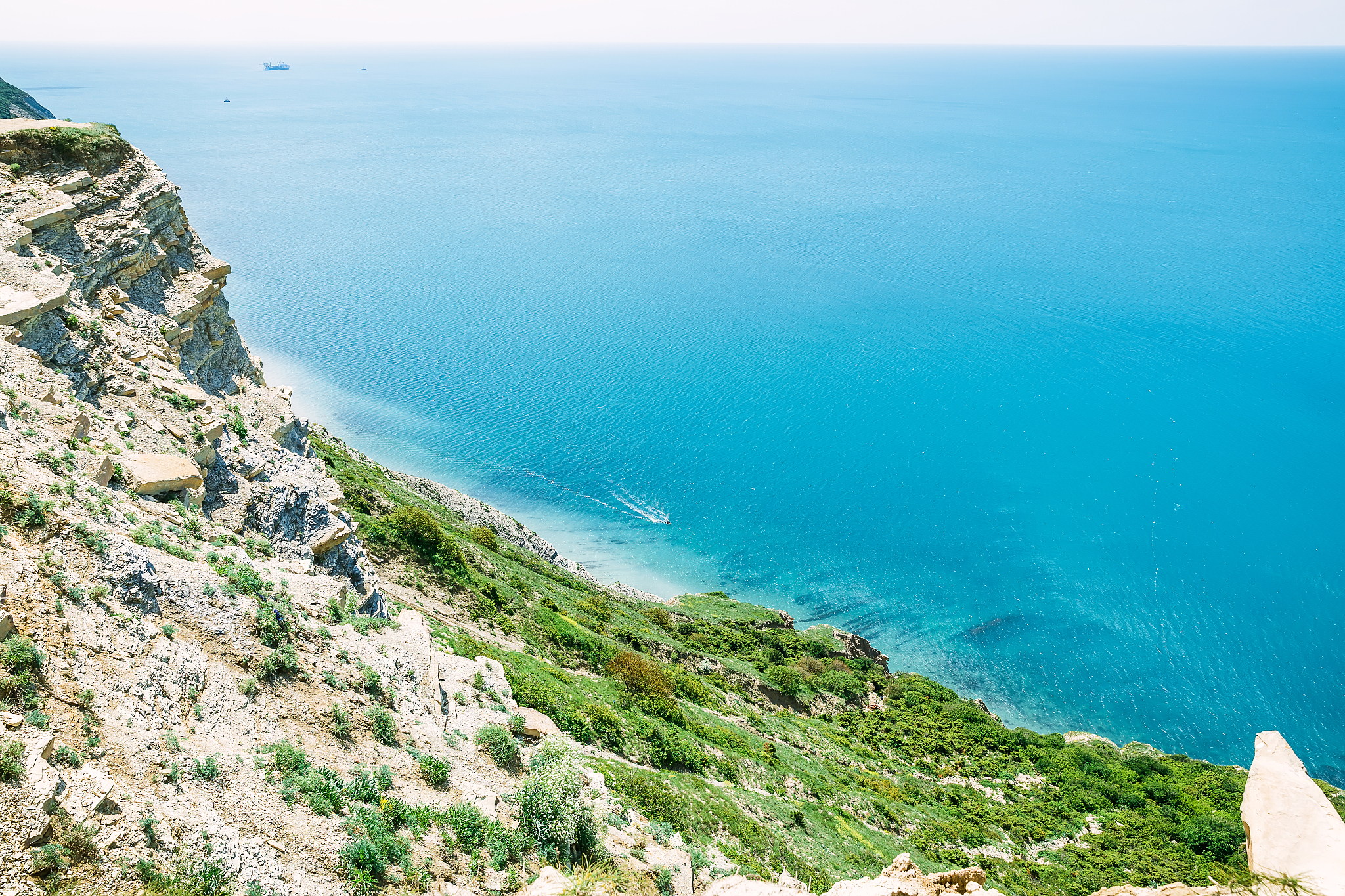 blue sea and rocky coast. summer day on ocean