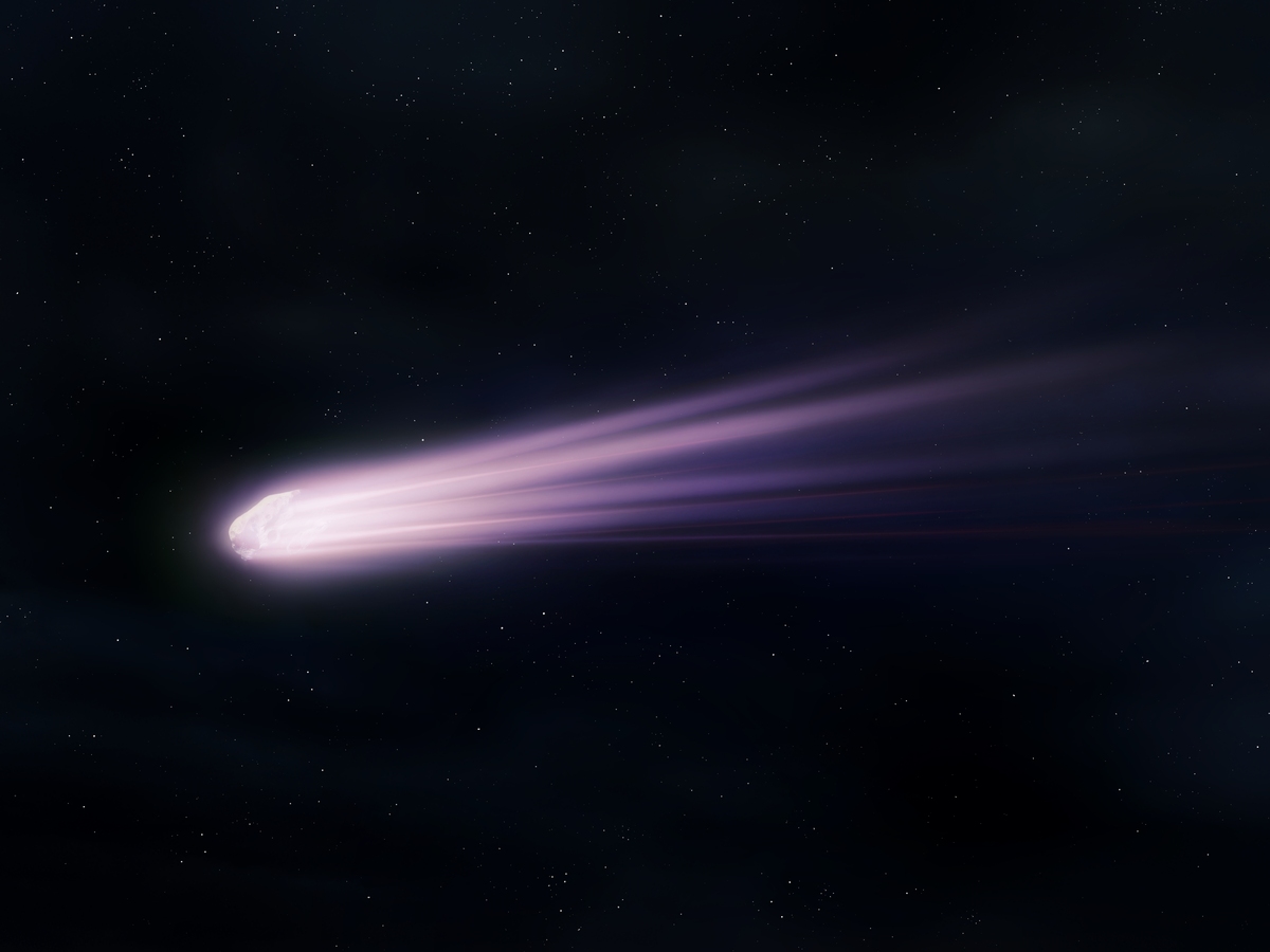 外太空的<strong>彗星</strong>.彗星拖着发光的尾巴,背景是星空.