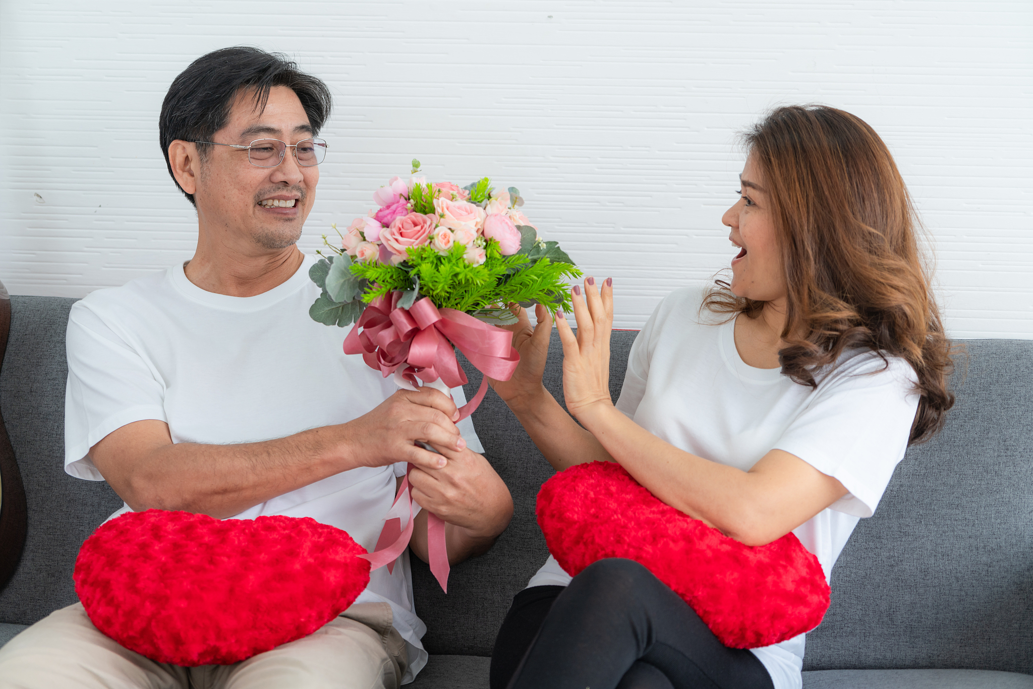 happy asian senior couple having good time at home. old people r