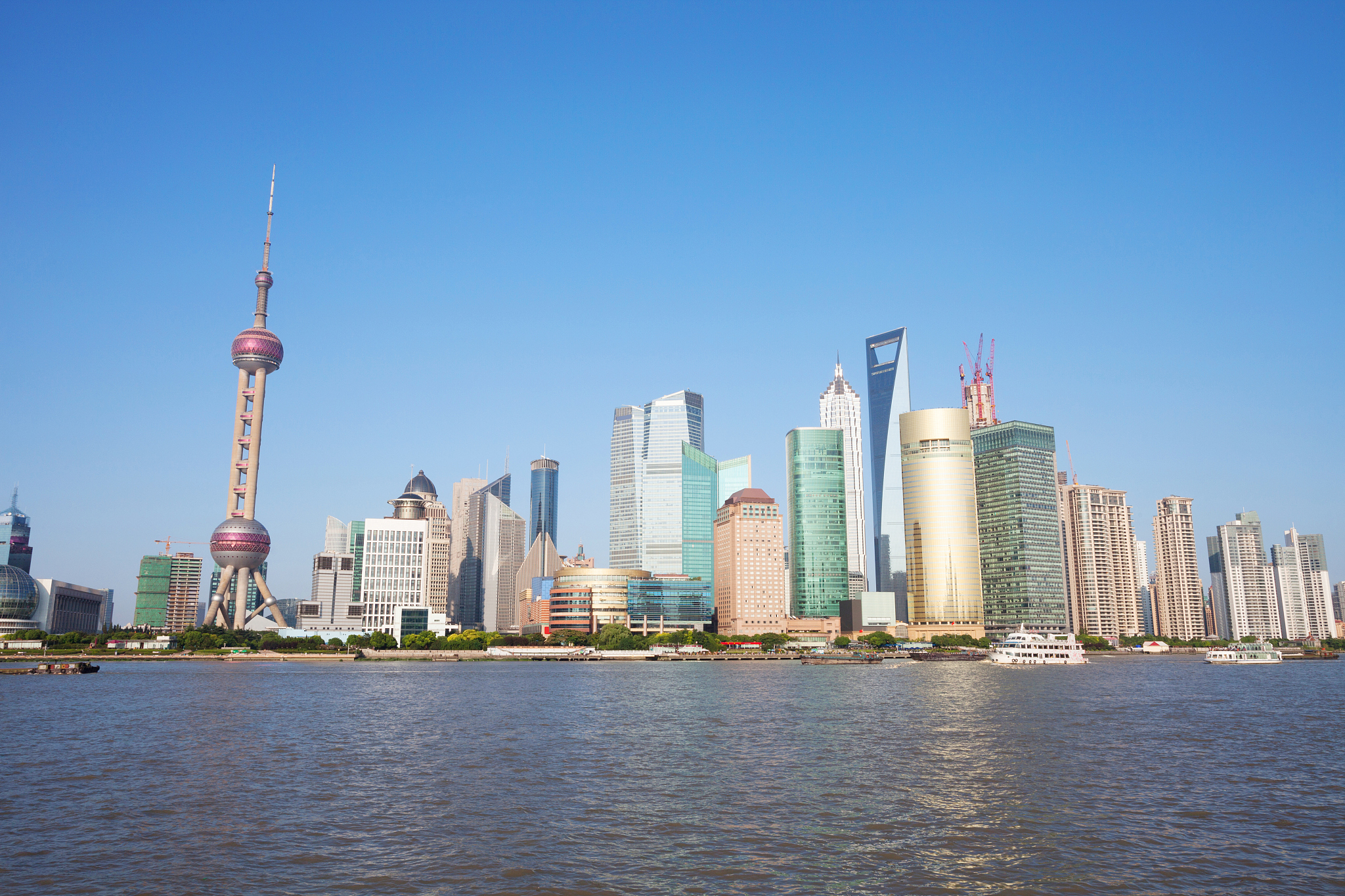 skyline and skyscrapers in shanghai at riverbank