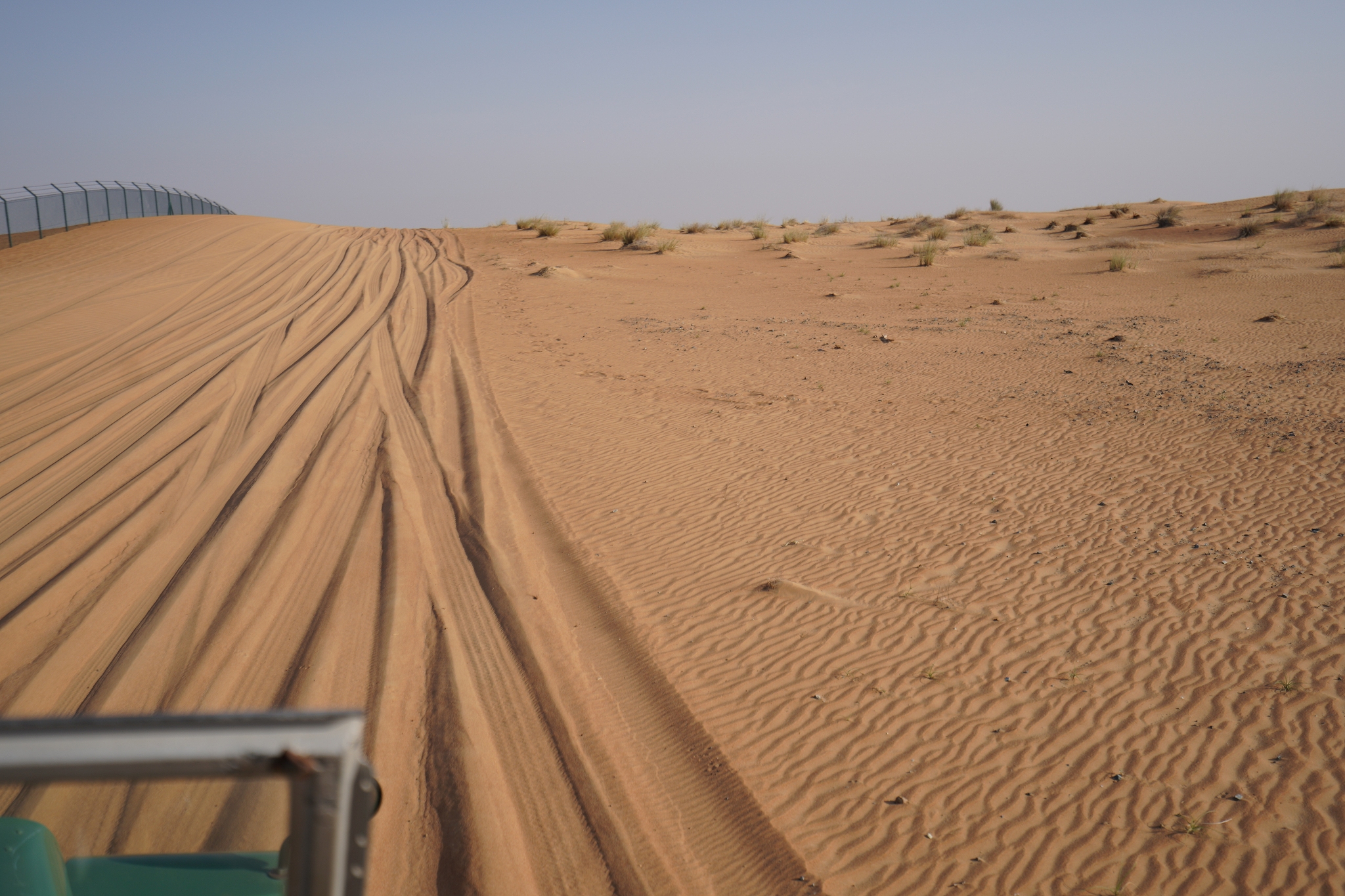 sand dunes in desert against clear sky