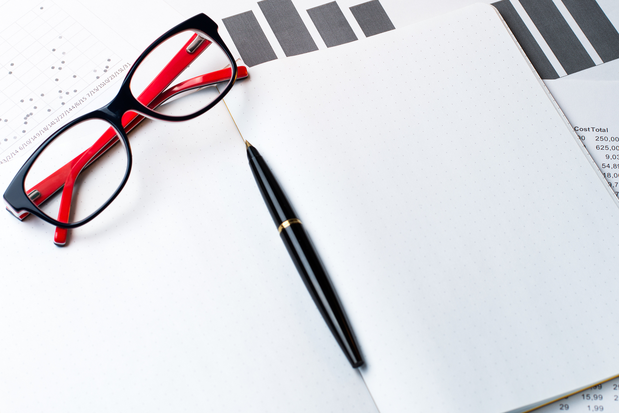 a pen and a notepad