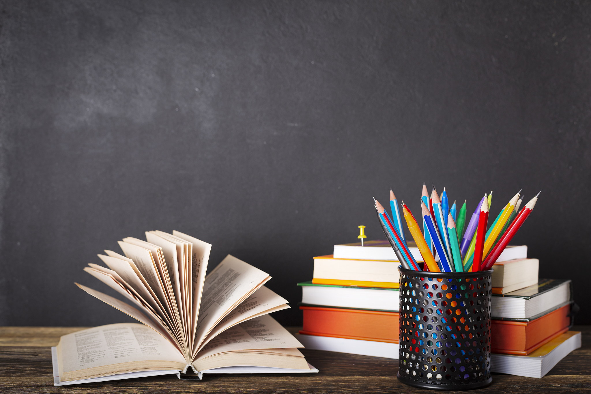 school books on desk, education concept. books on the table in t