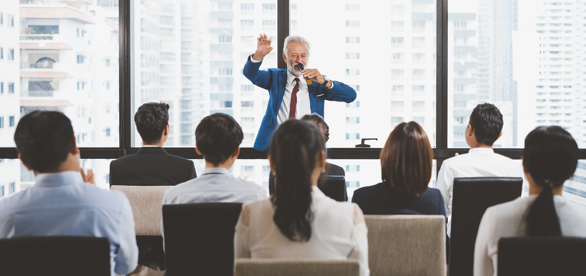 group of business people raise hands up to ask question and answ