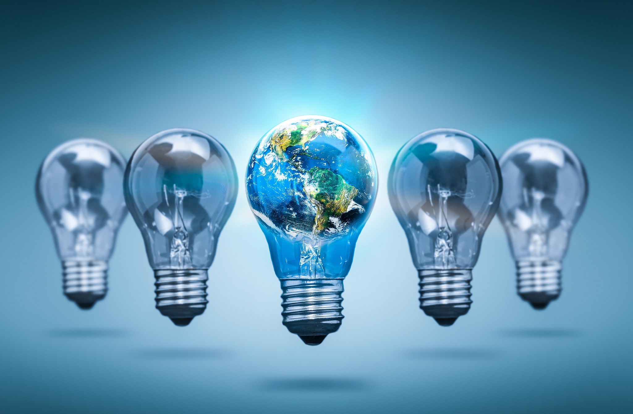 lightbulb in the shape of the world - bulb concepts.