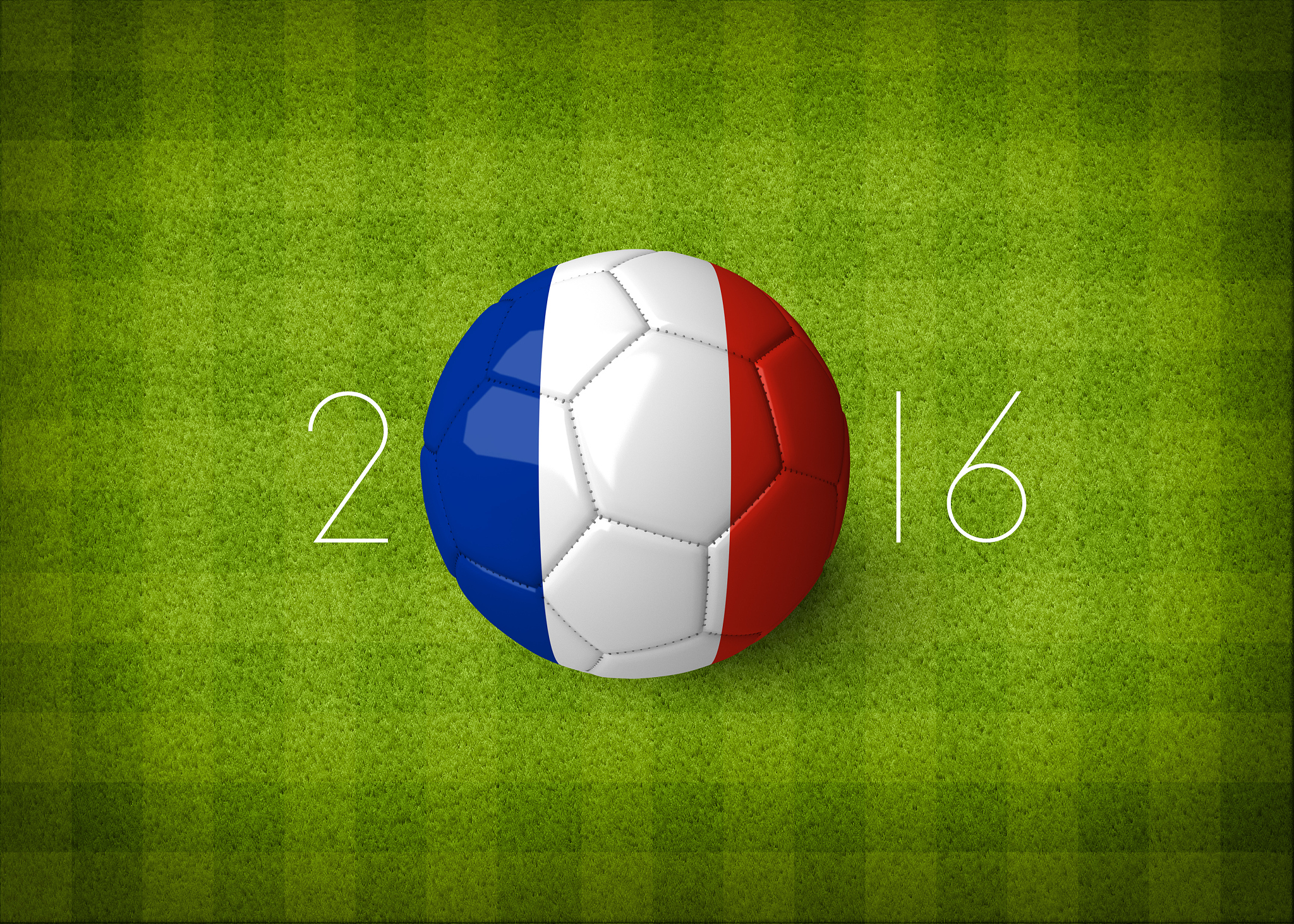soccer ball with a france flag on soccer field.