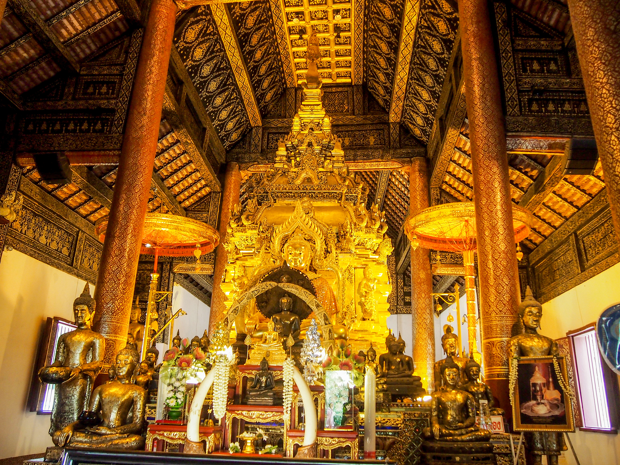 the golden buddha in the temple is a sacred buddhist.