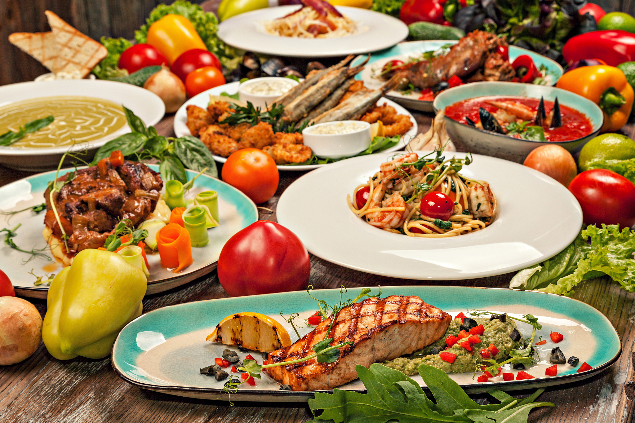 set of various dishes of italiancuisine, vegetables and herbs on