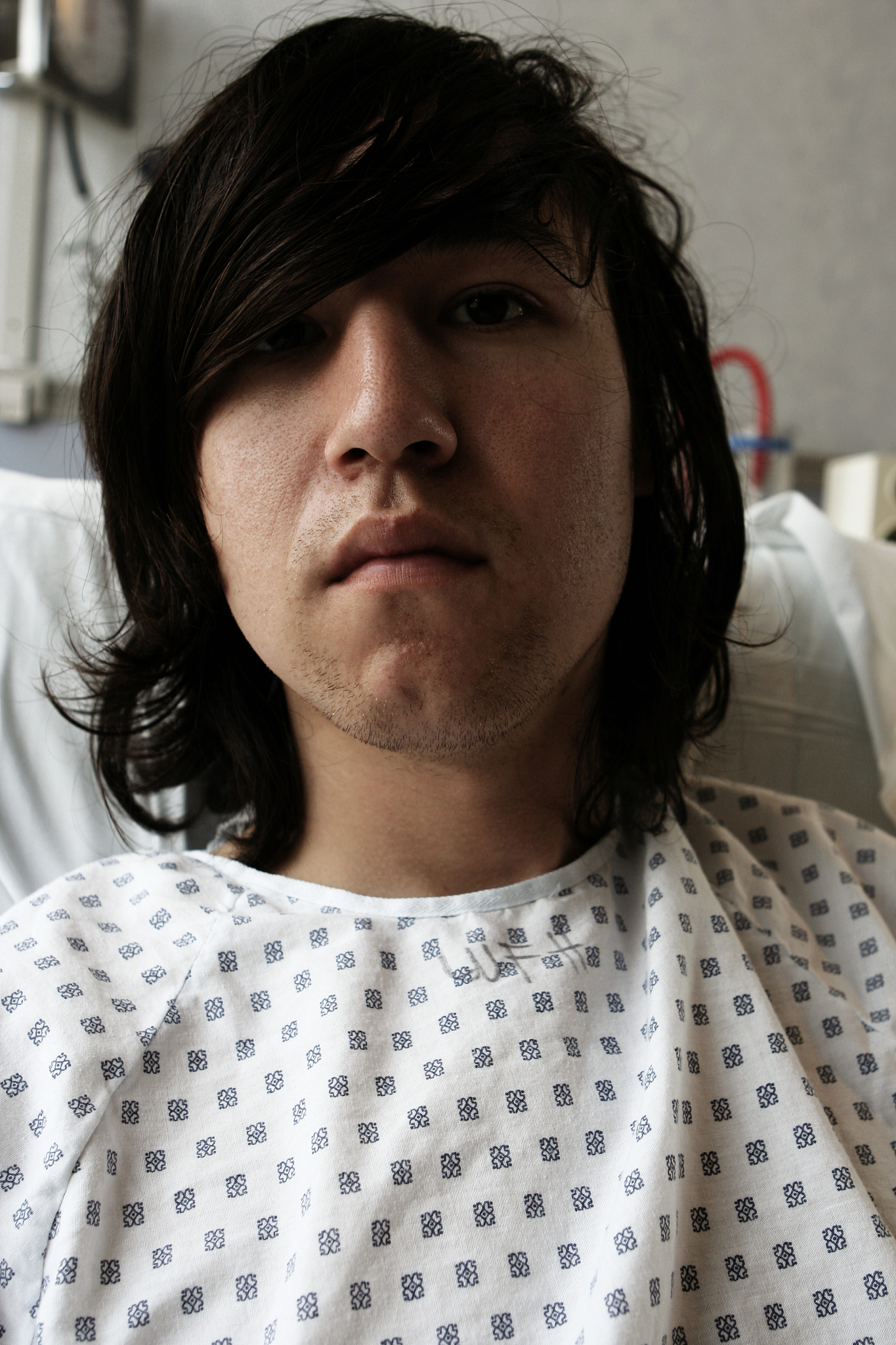 young asian man in the hospital