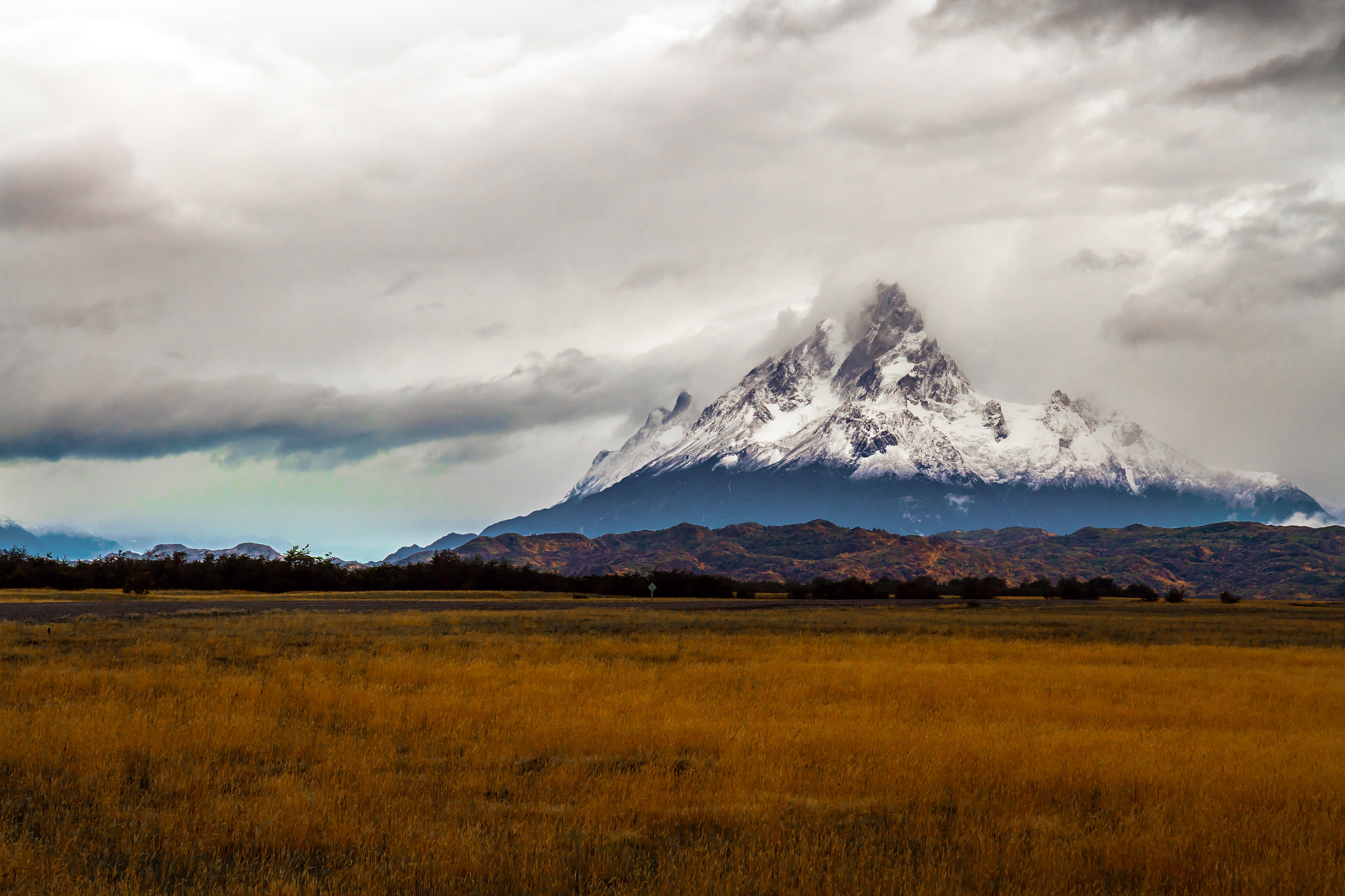 peaked snow-capped mountain peak