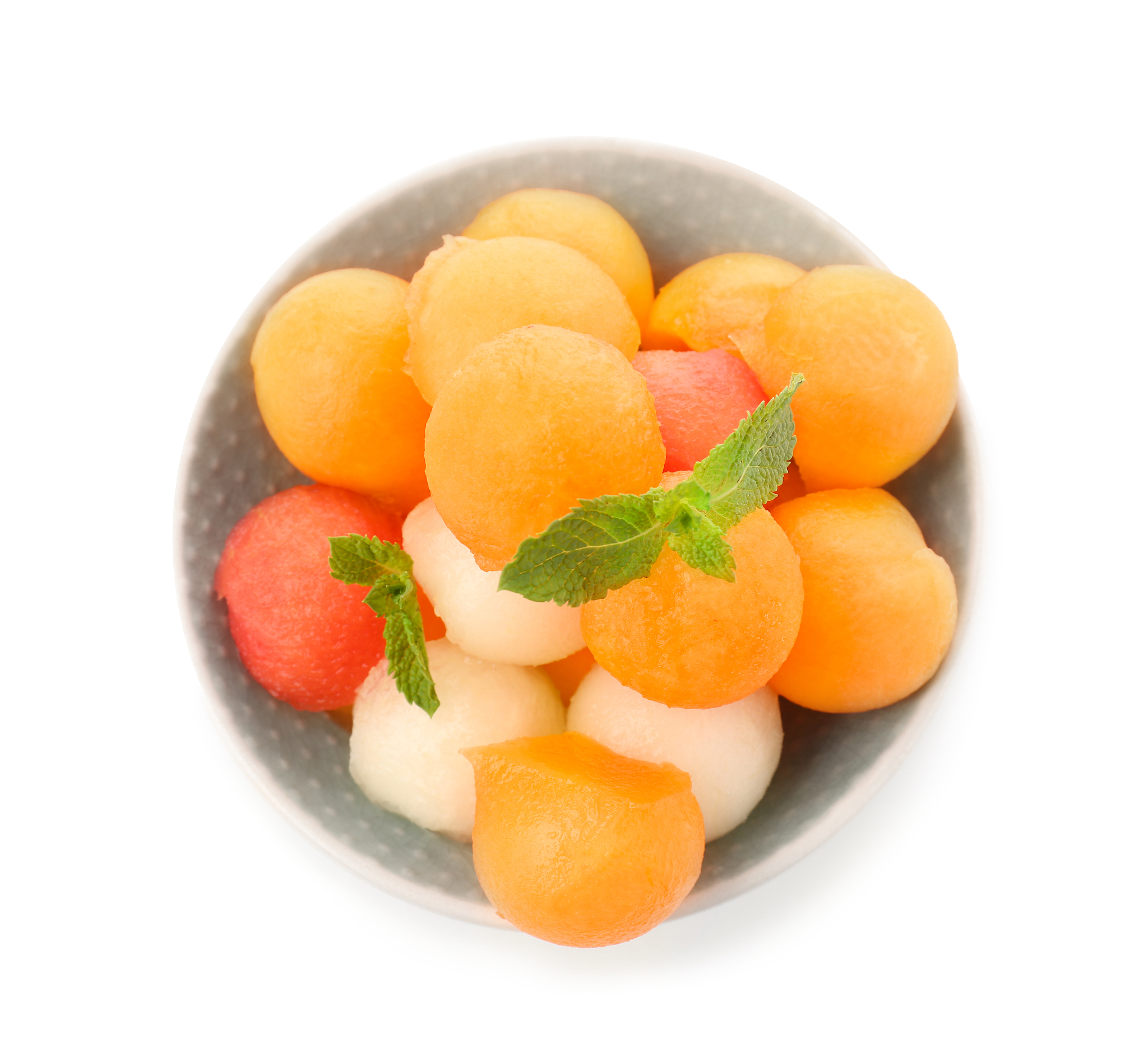 bowl with tasty melon dessert on white background