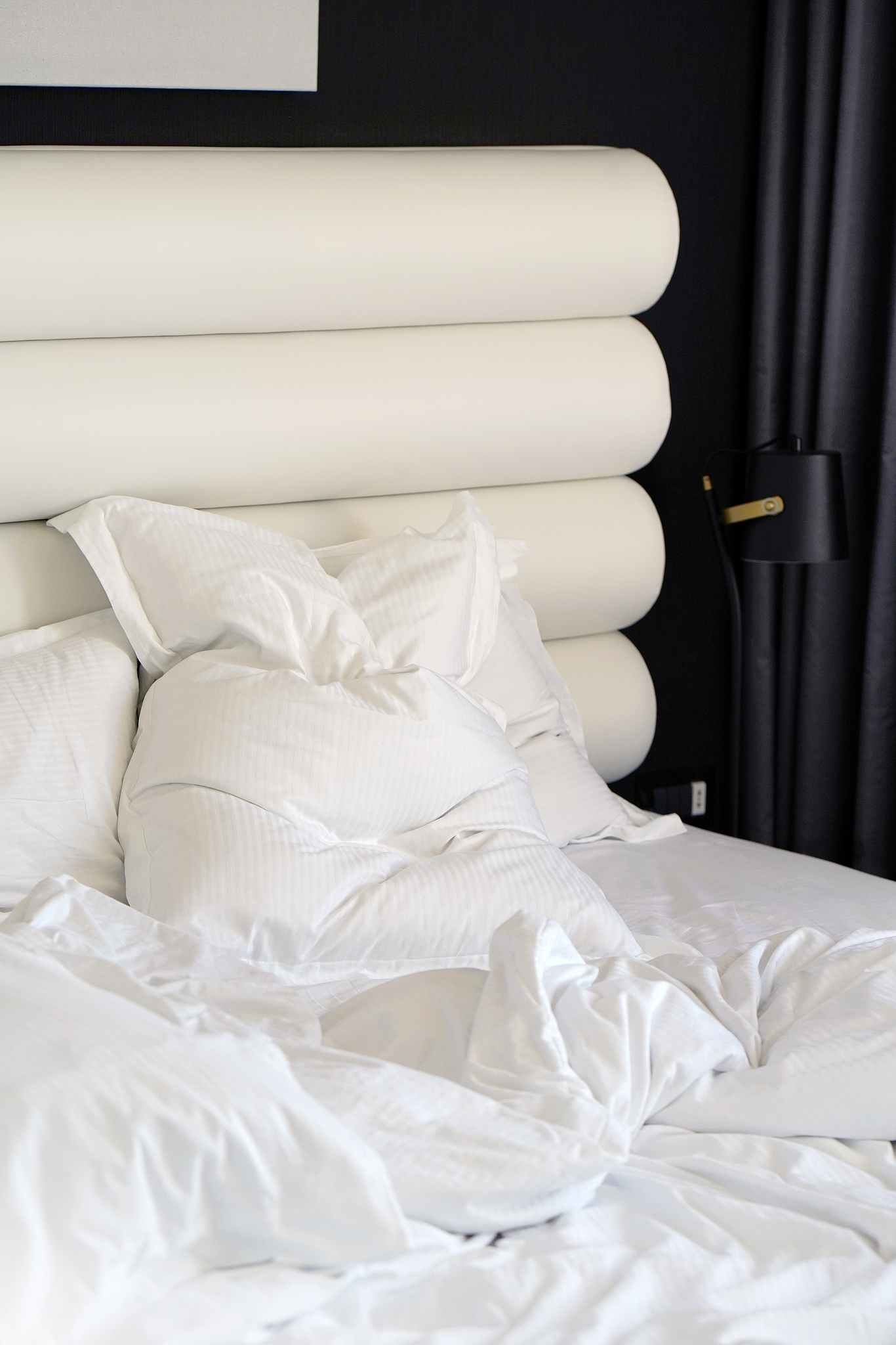 dirty bed in the hotel. dirty bed pillow blanket room.