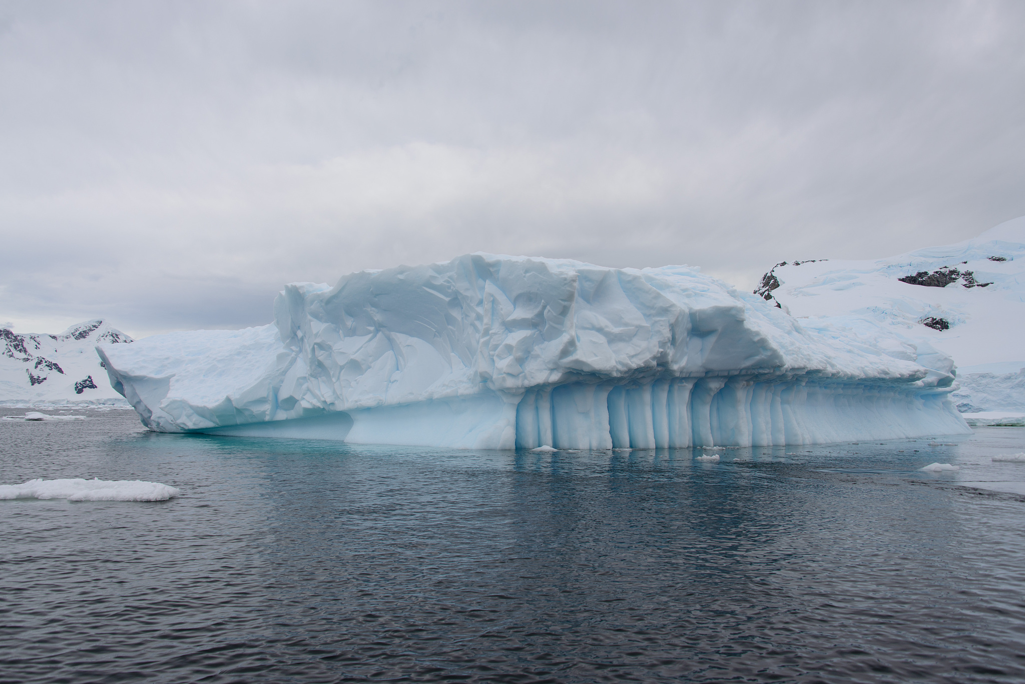 antarctic landscape with glacier and mountains