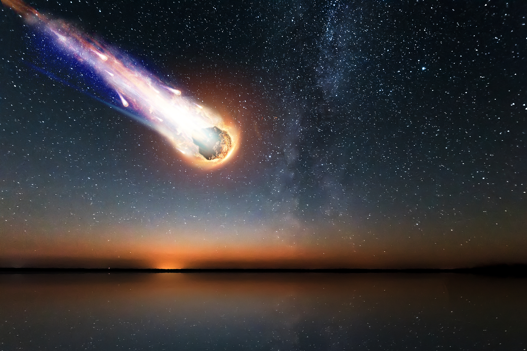 a comet, an asteroid, a meteorite falls to the ground against a 