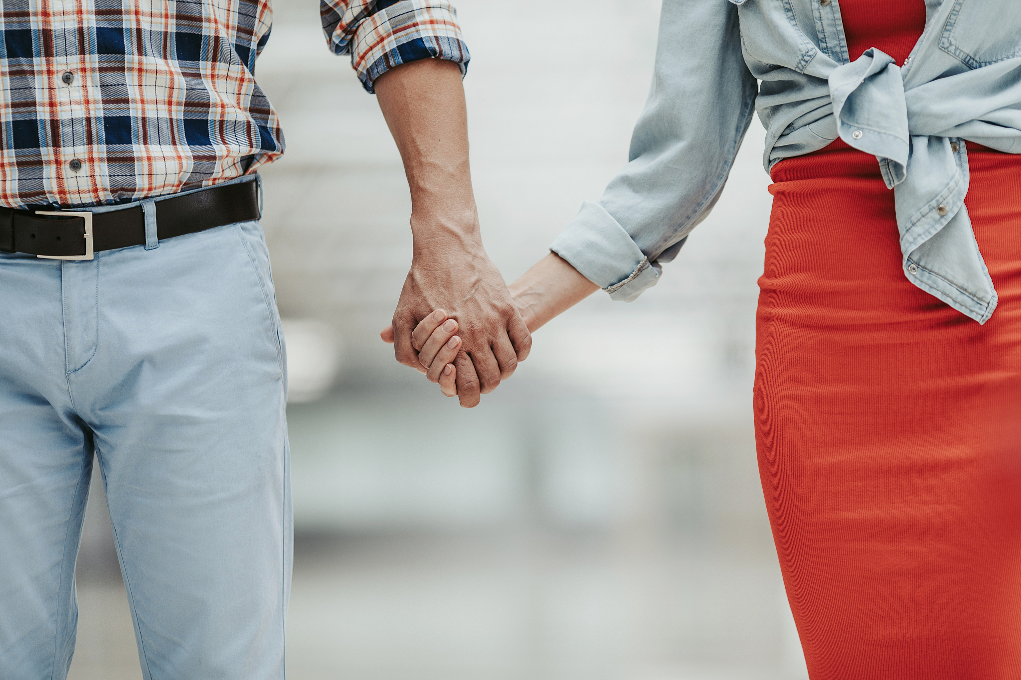 female and man hands together
