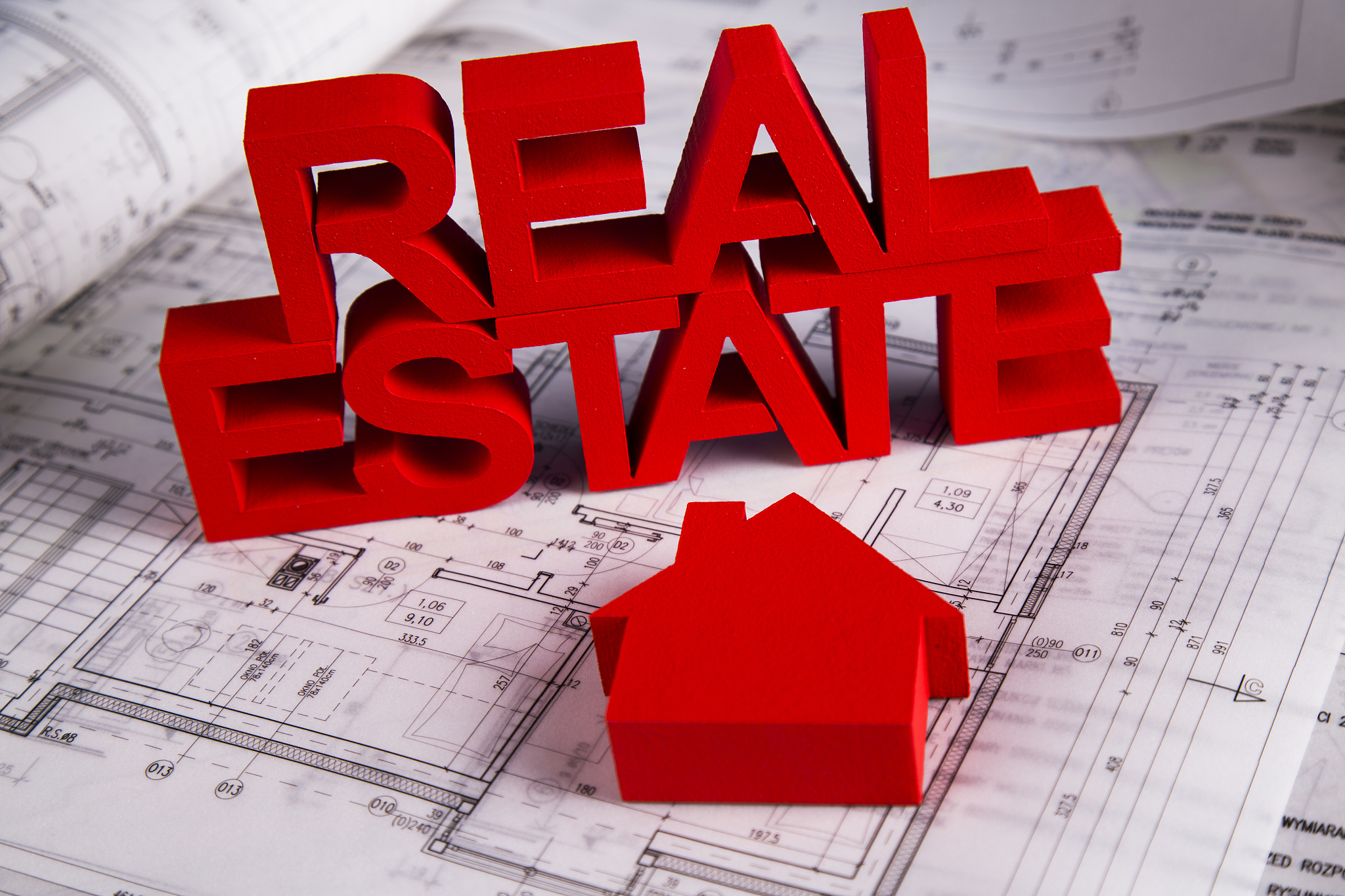 real estate agency concept and blueprints