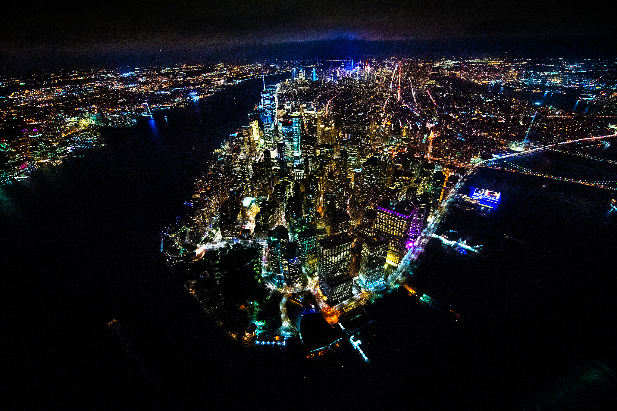 manhattan island and one world trade center as viewed from a hel
