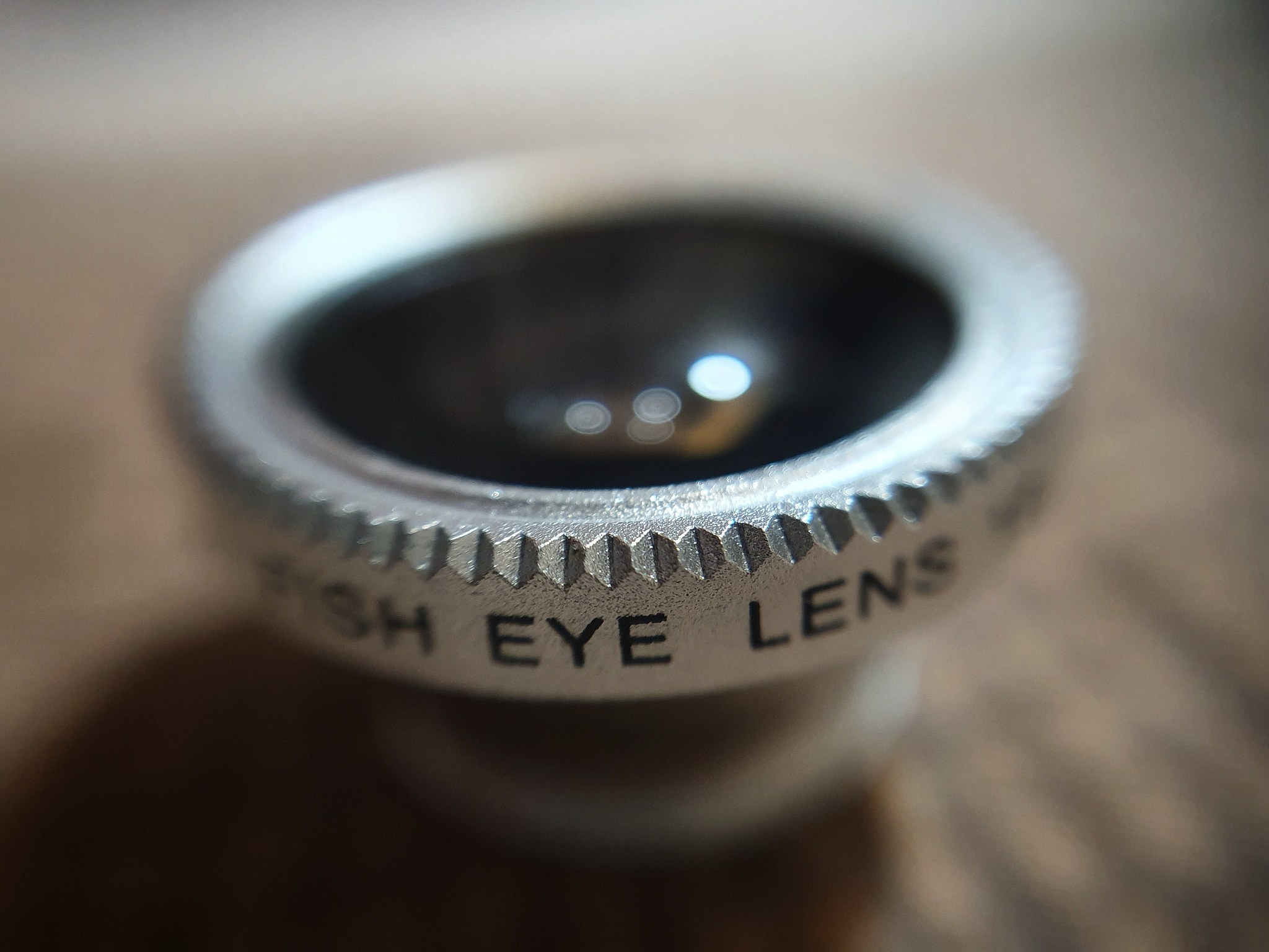 close-up of camera lens on table