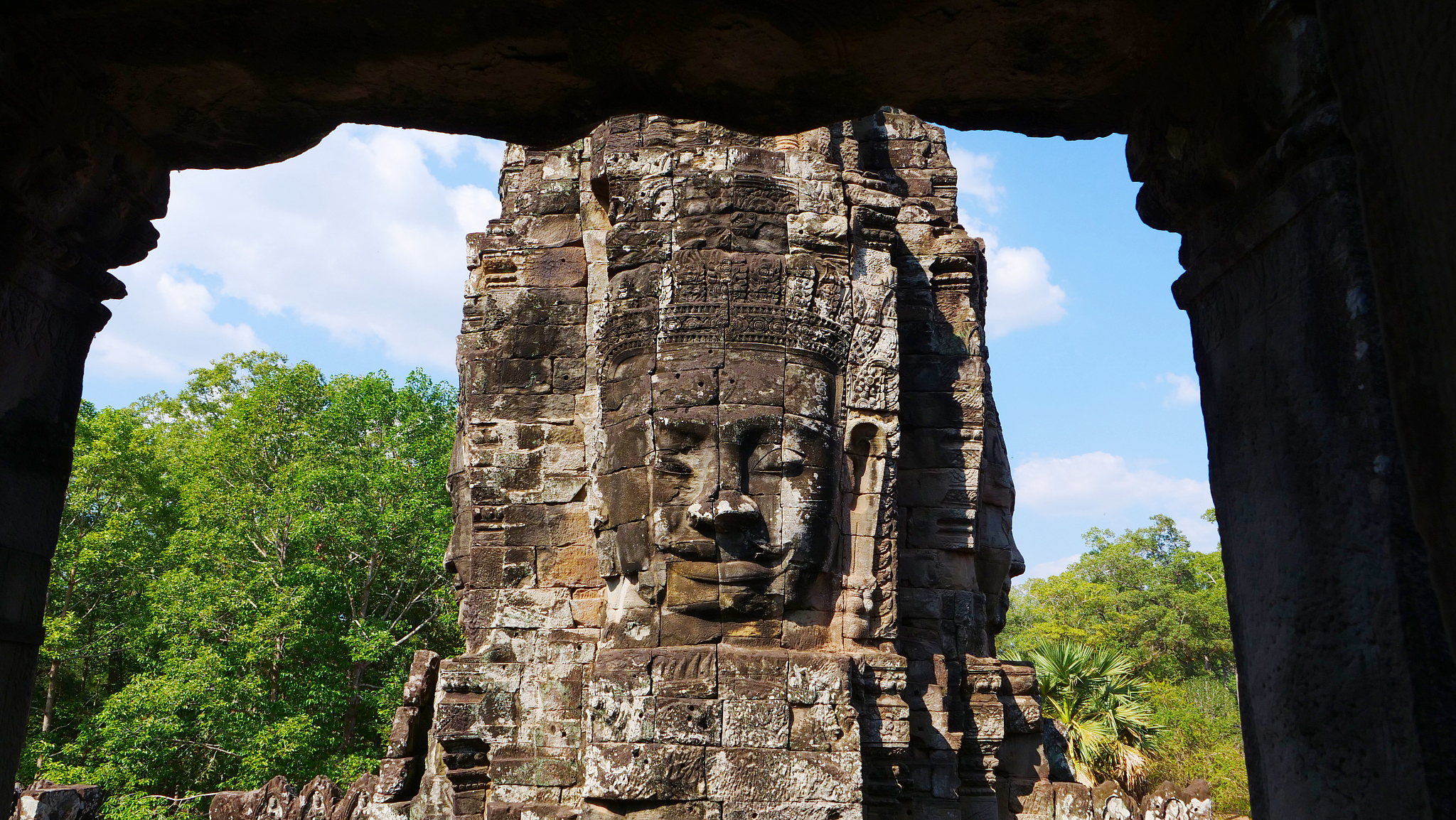 face tower at the bayon temple in angkor wat complex, siem reap 
