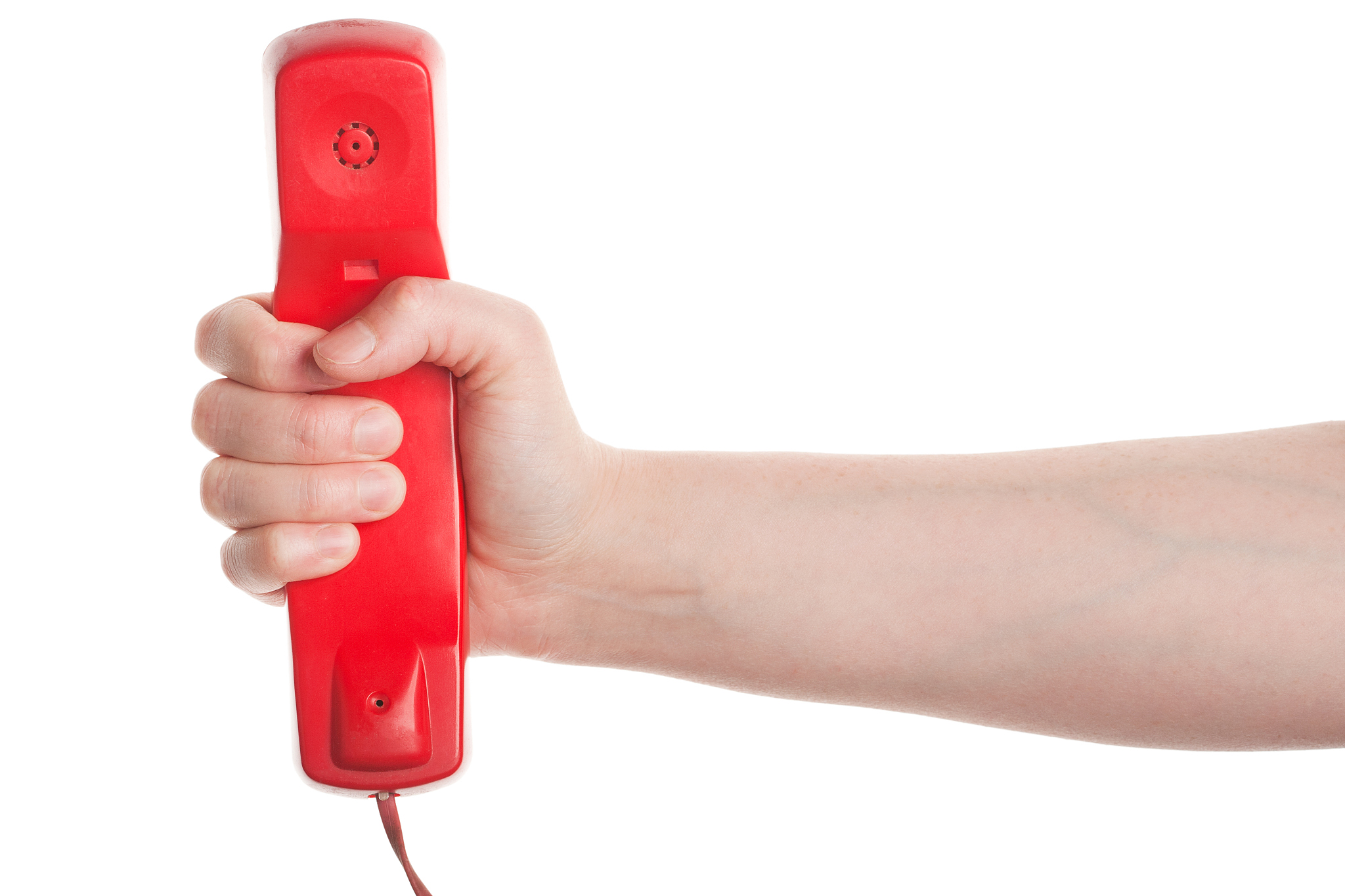 red telephone receiver in hand