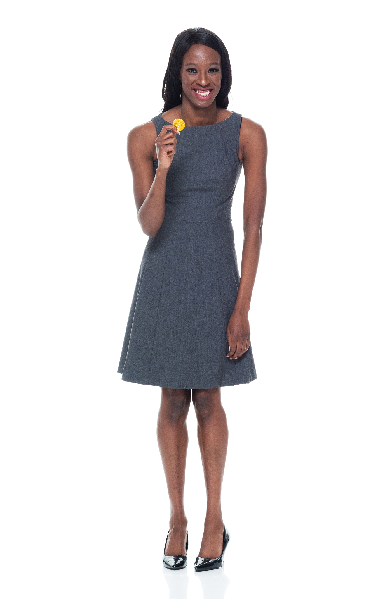 black businesswoman holding bitcoin