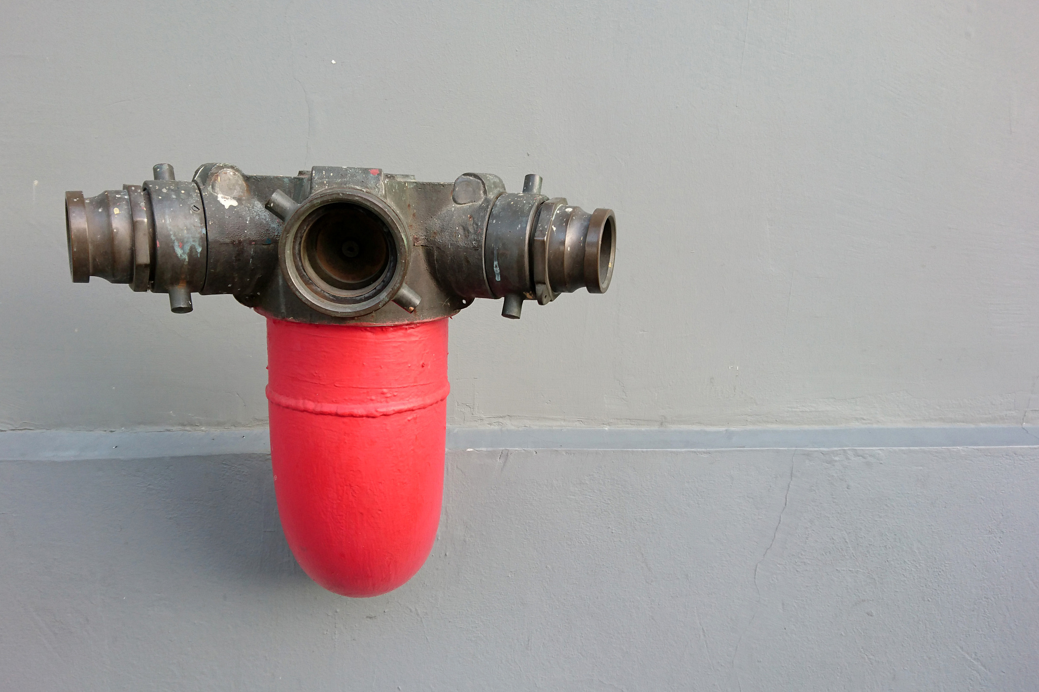 red fire hydrant pipes