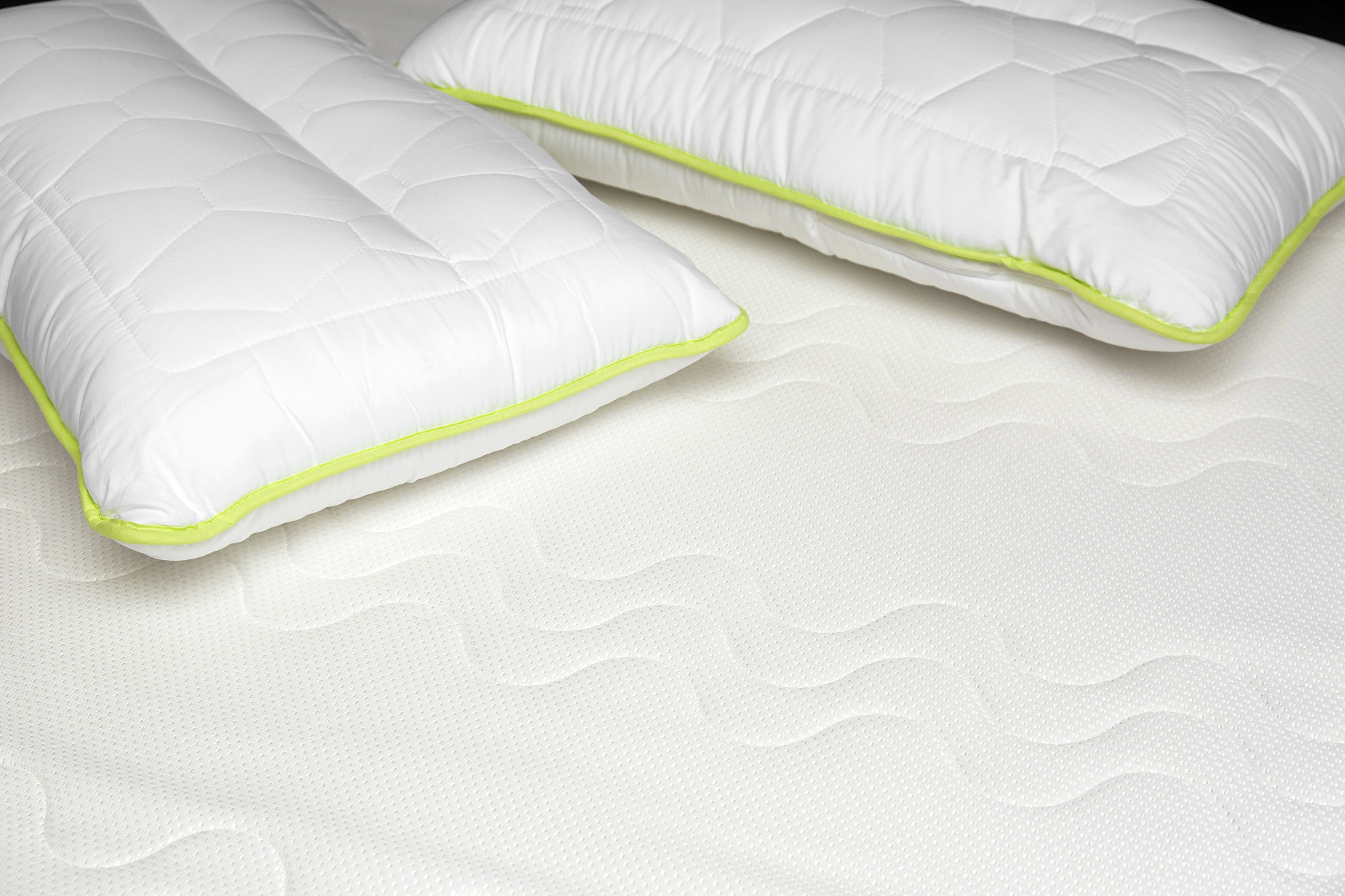 closeup of orthopedic mattress and pillows