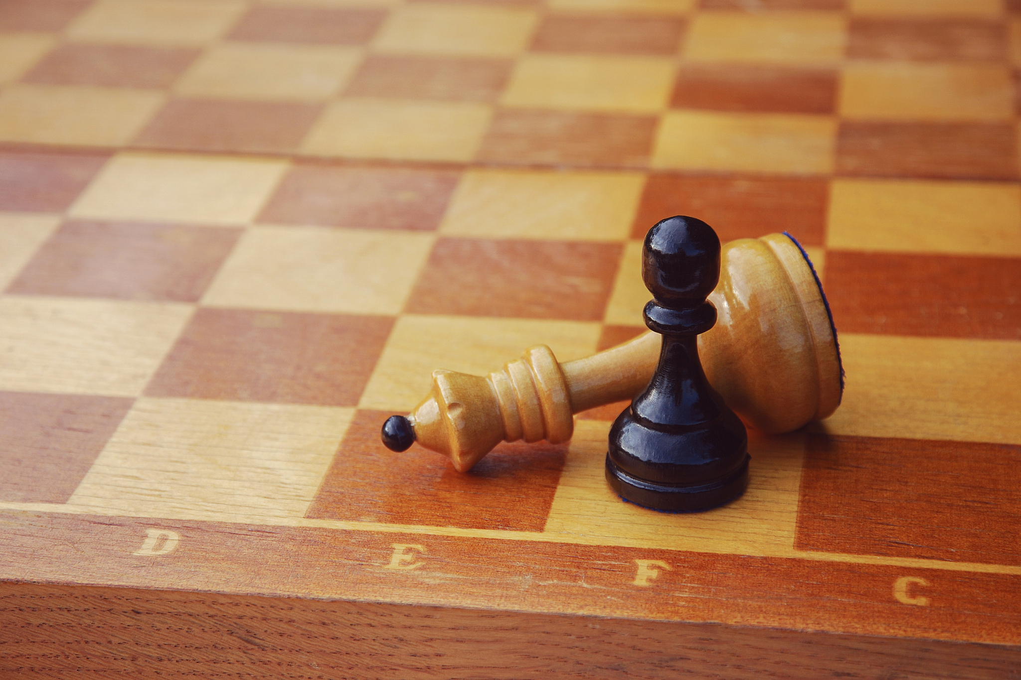 black pawn won chess game, weak opponent defeated superior force