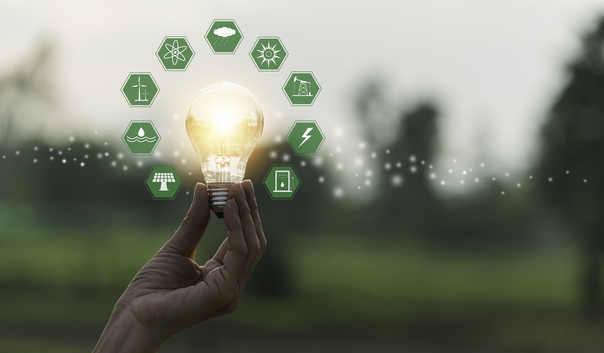 innovation or creative concept of hand hold a light bulb and cop