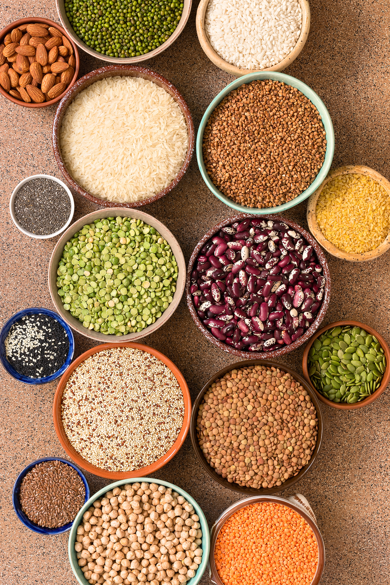 collection of various of legumes, beans, grains and seeds in bow