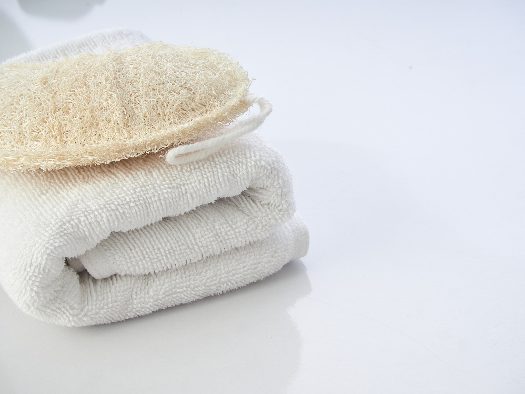 set of spa accessories skin care on a white table