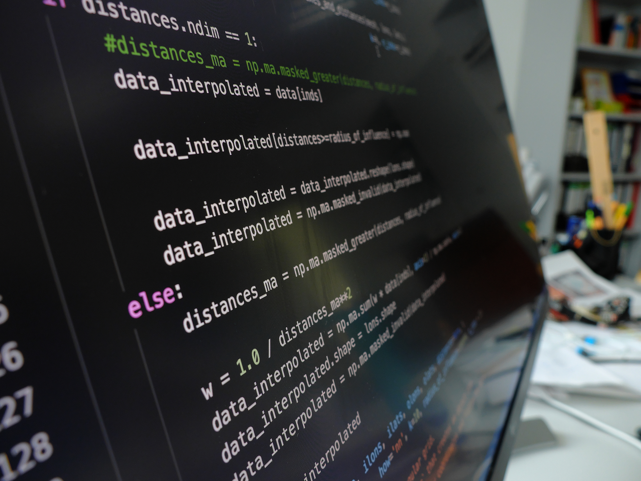 closeup of the python code on the monitor