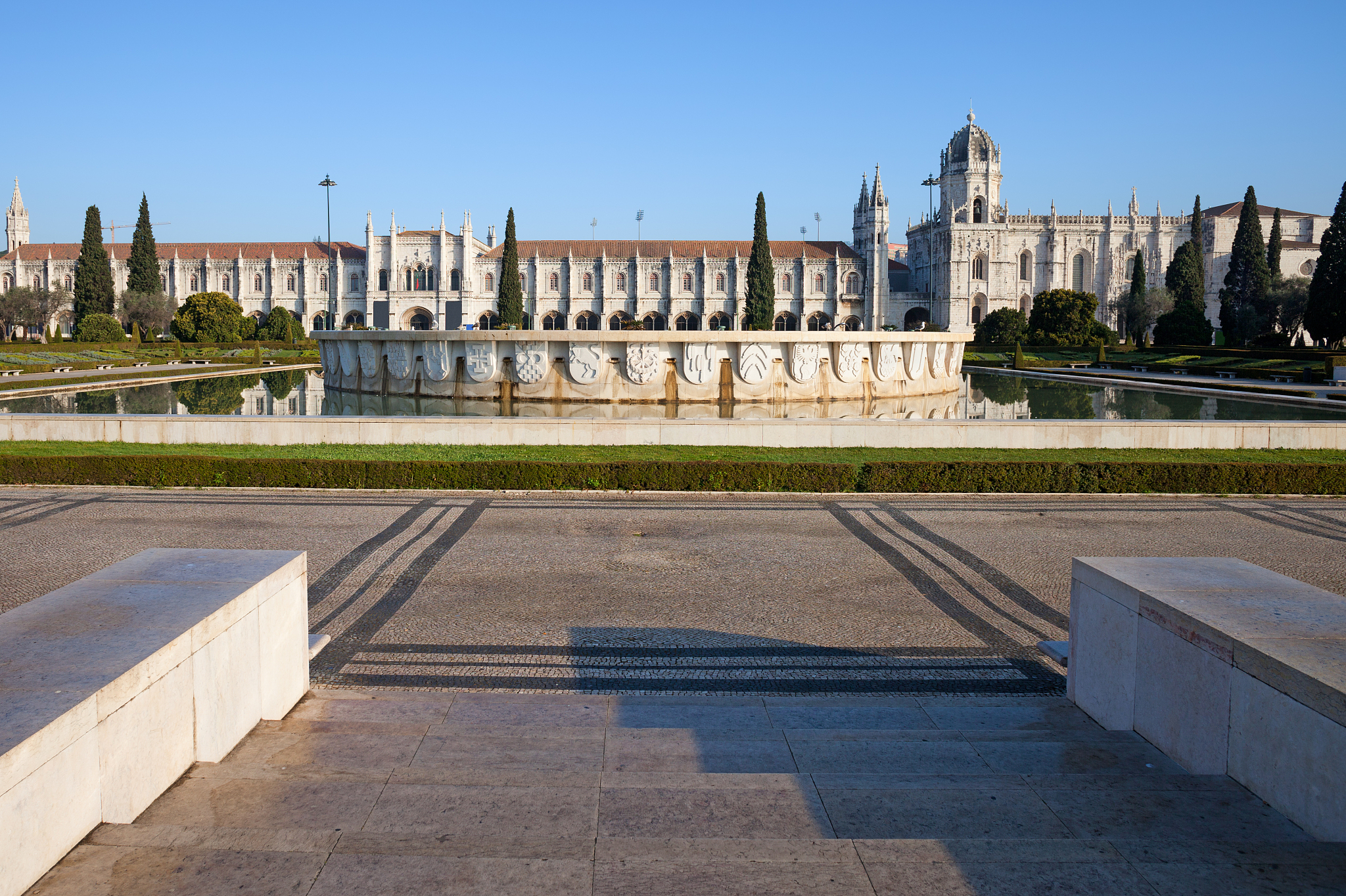 garden praca do imperio and jeronimos monastery in lisbon