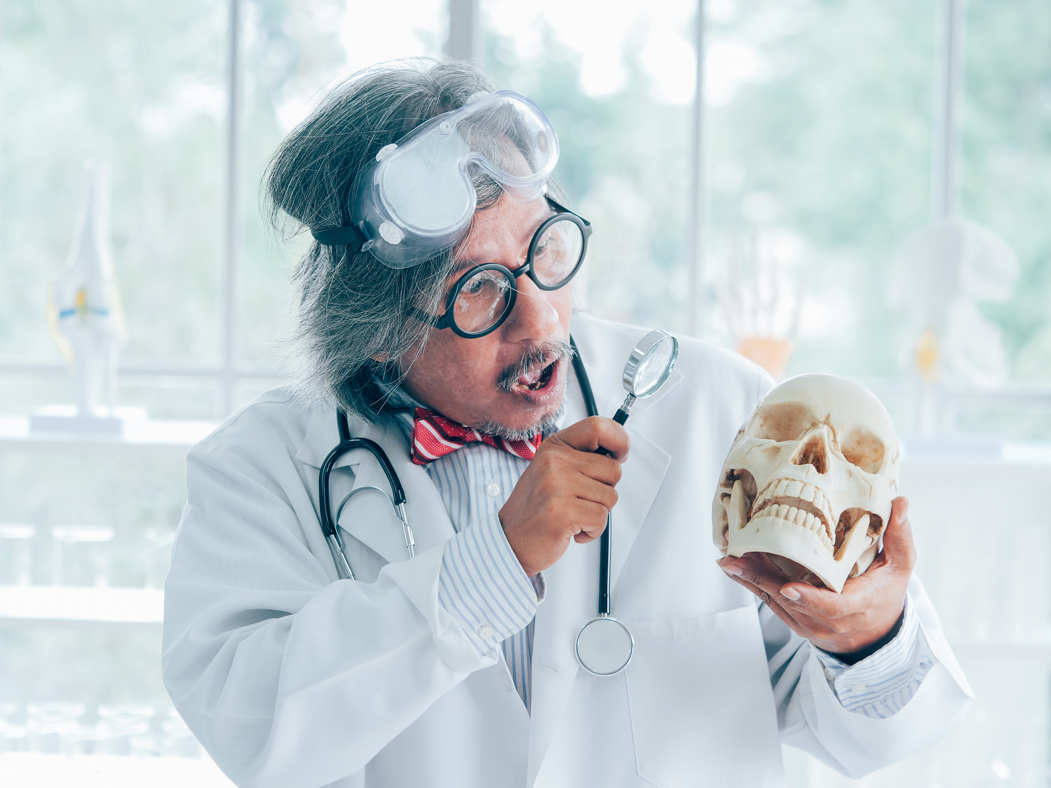 asian senior medical research scientist working in lap