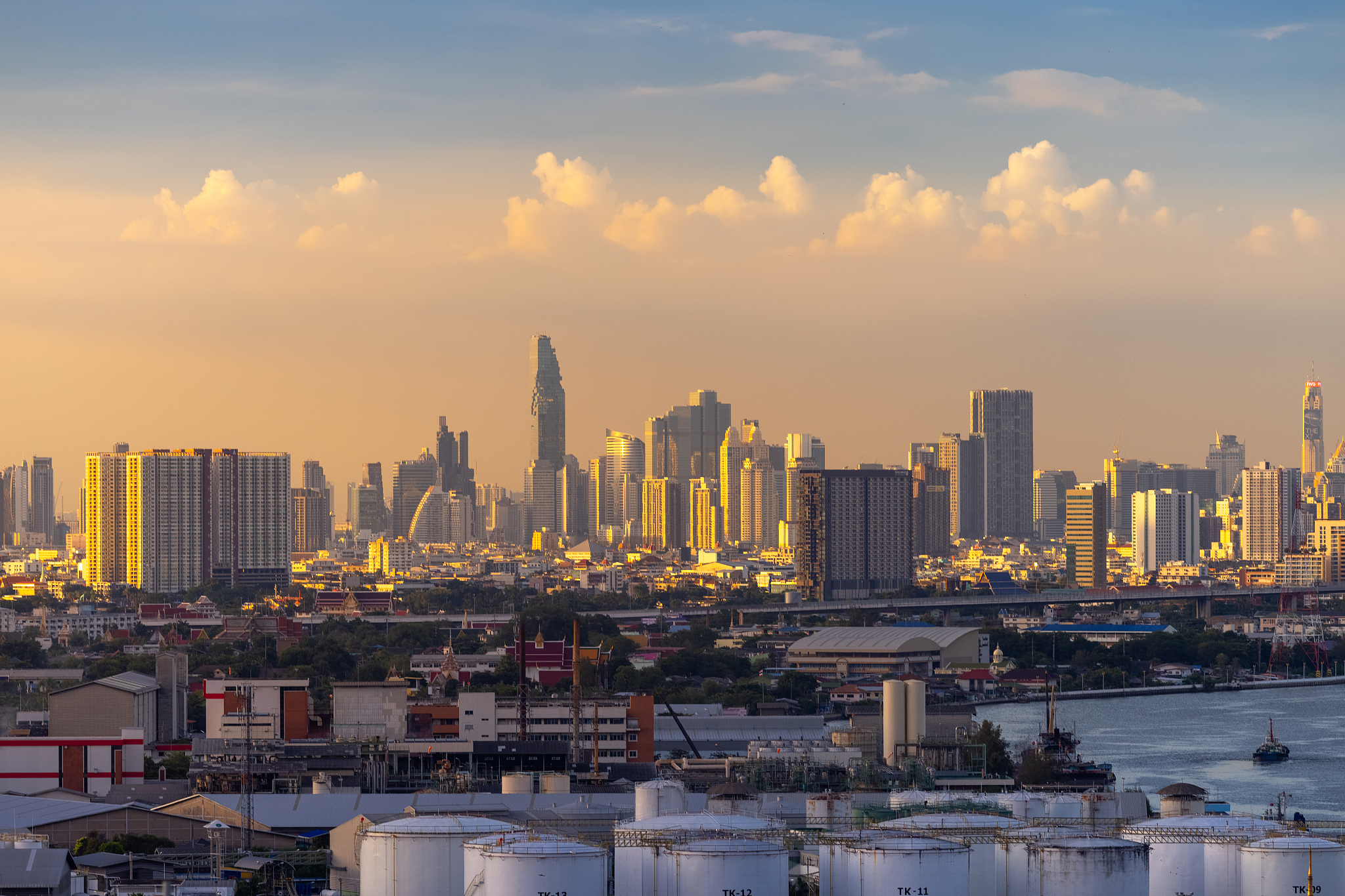 bangkok cityscape, chaophraya river, container ship, and bhumibo