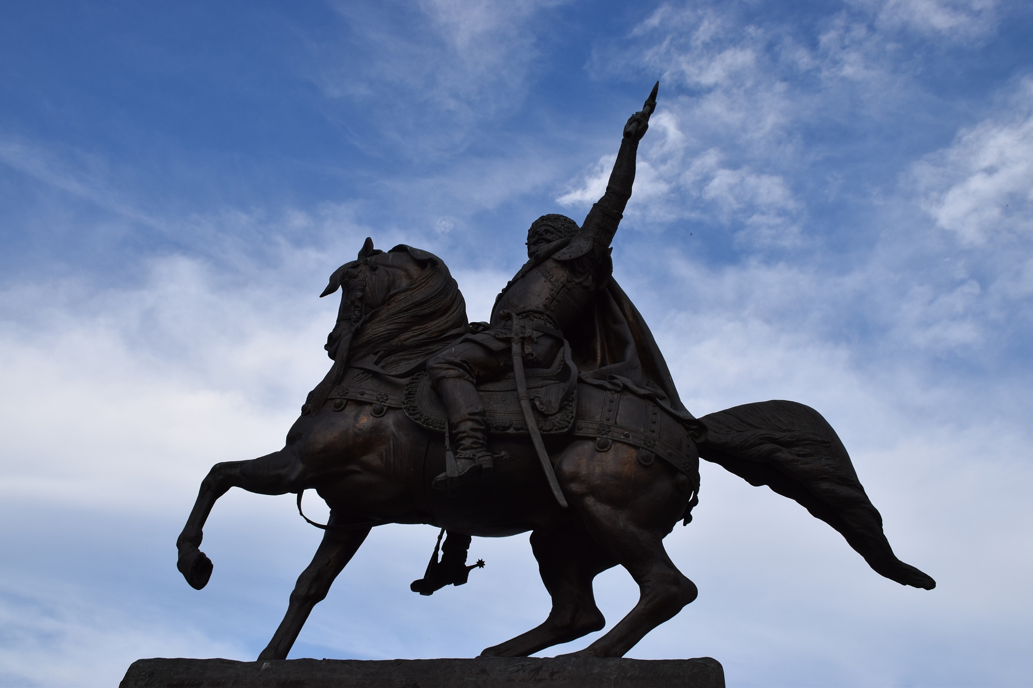low angle view of statue against sky