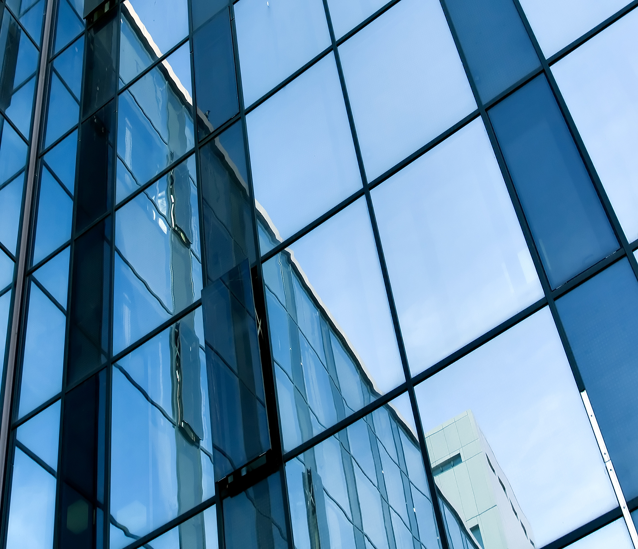 blue glass transparent wall of modern bulding house