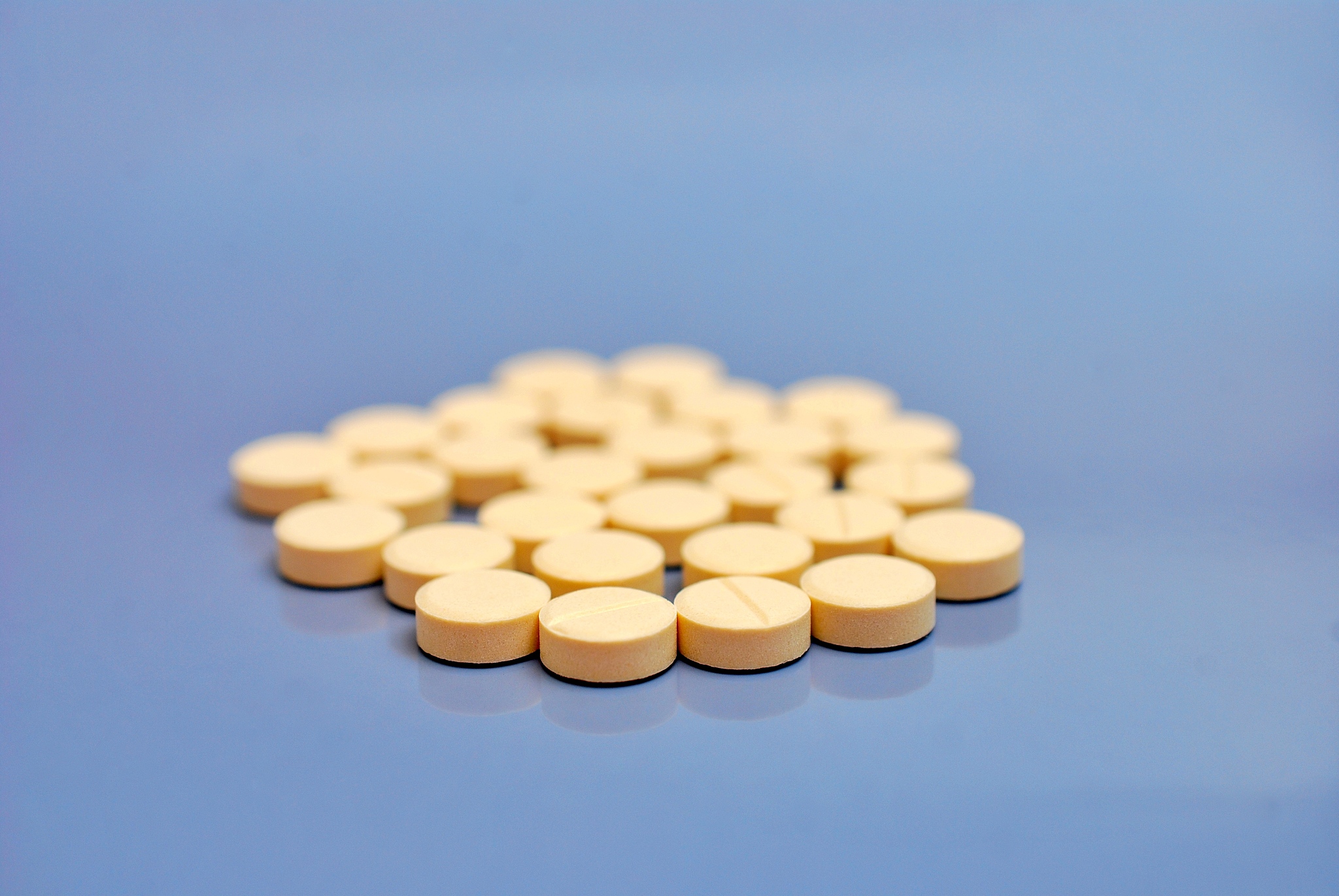 pills on a gray background, healthcare theme