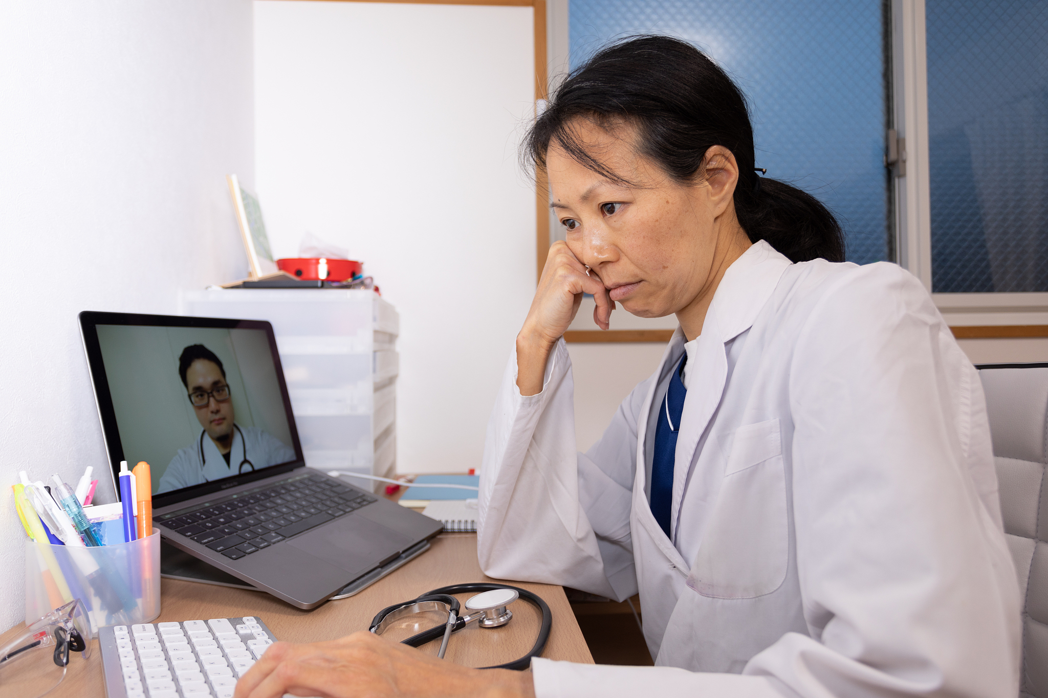 female health care workers having video conference