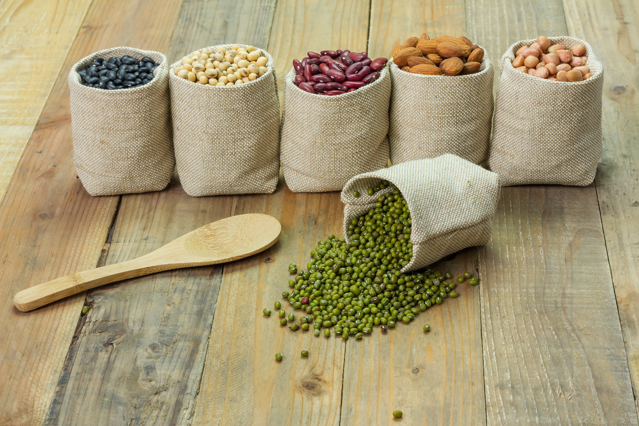 different kinds of beans in sacks bag