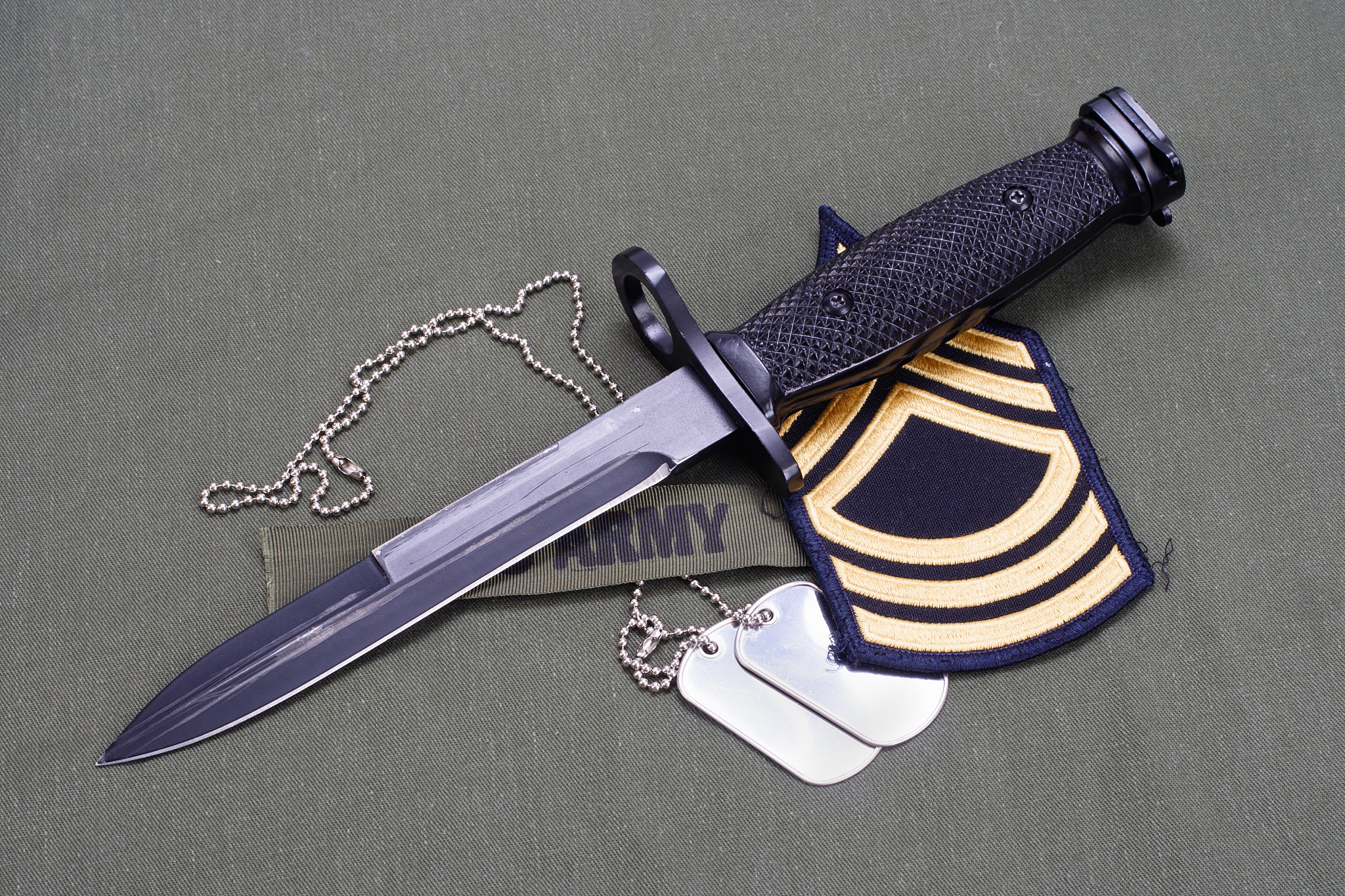 bayonet and dog tags on us army uniform