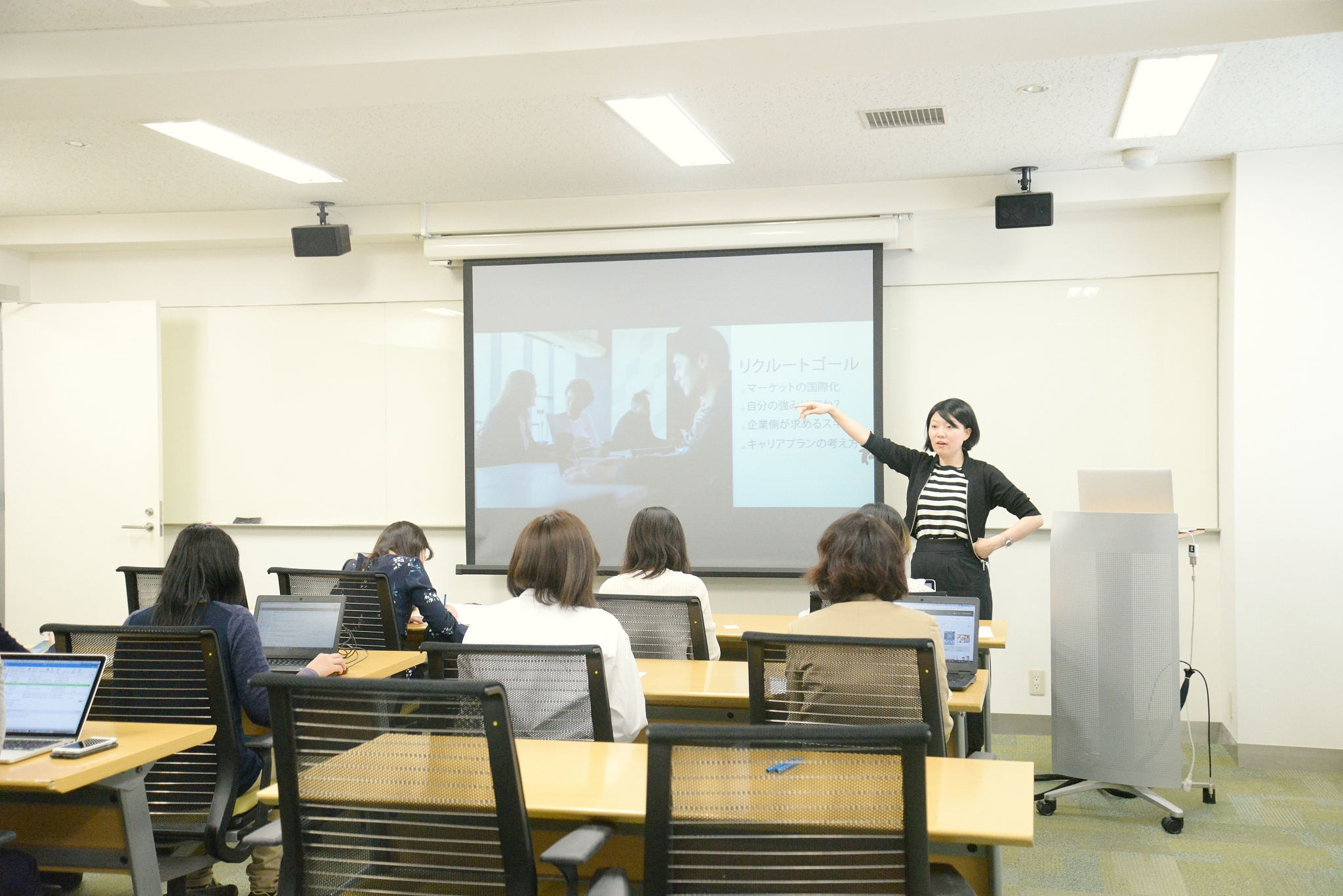 young business woman giving a presentation