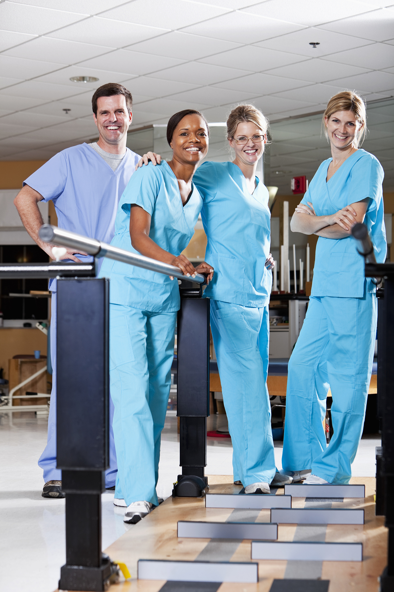 physical therapists in rehabilitation room