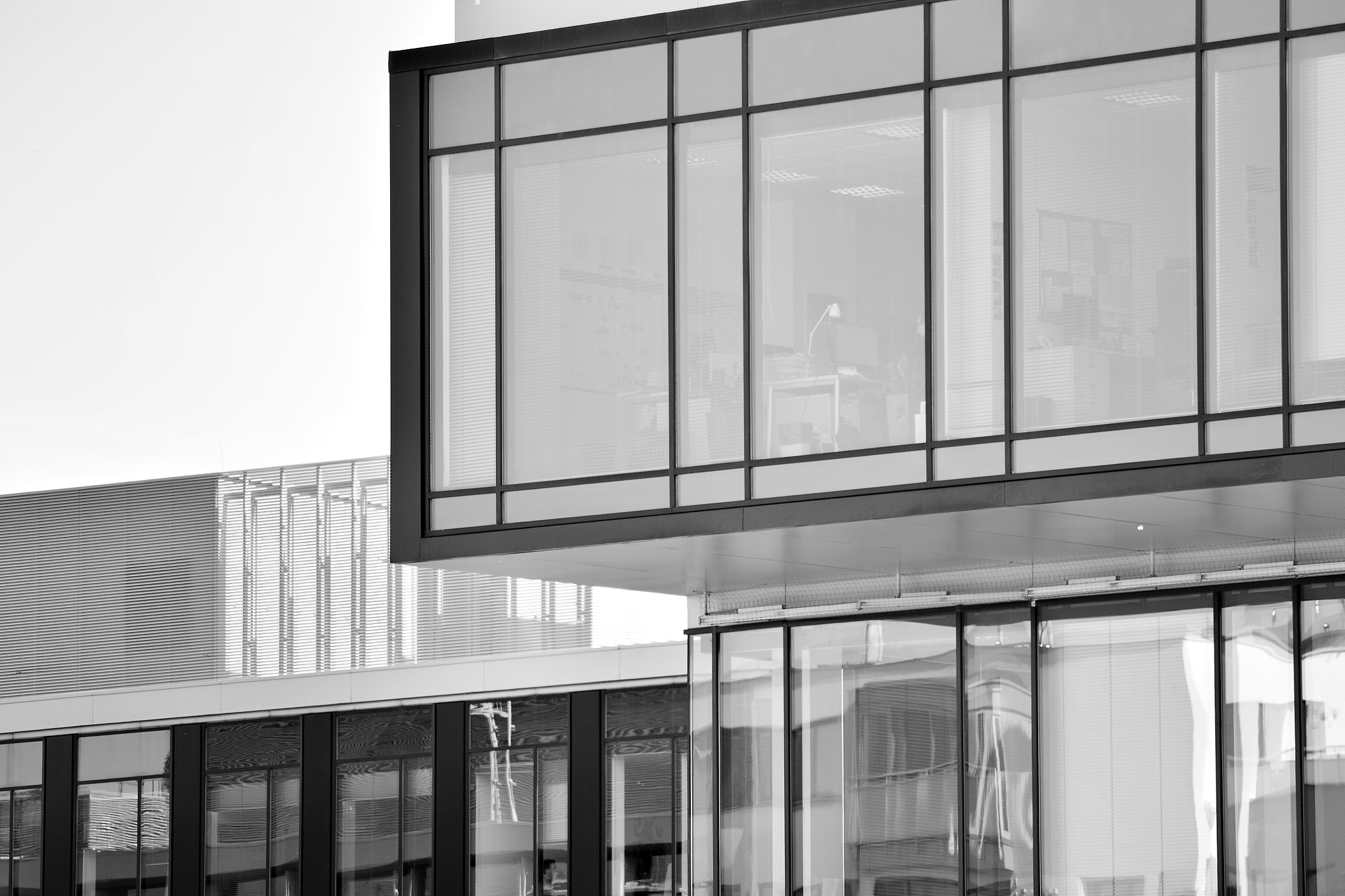 modern office building wall made of steel and glass. black and w